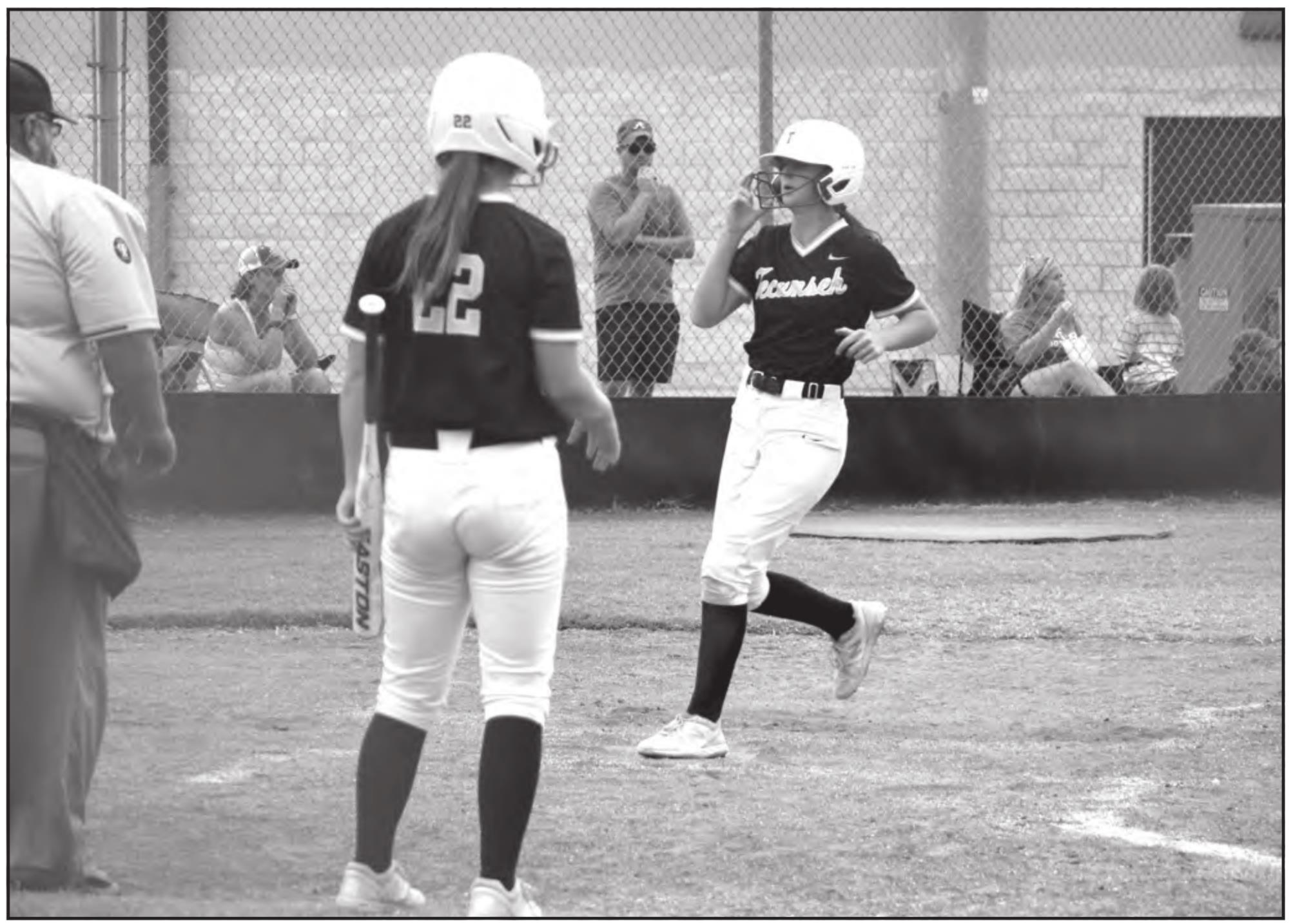 Tecumseh’s Emily Gage crosses home after stealing third and running on during the third inning of the home game against Bethel on Sept. 28. Tecumseh won 8-0. Countywide &amp; Sun/