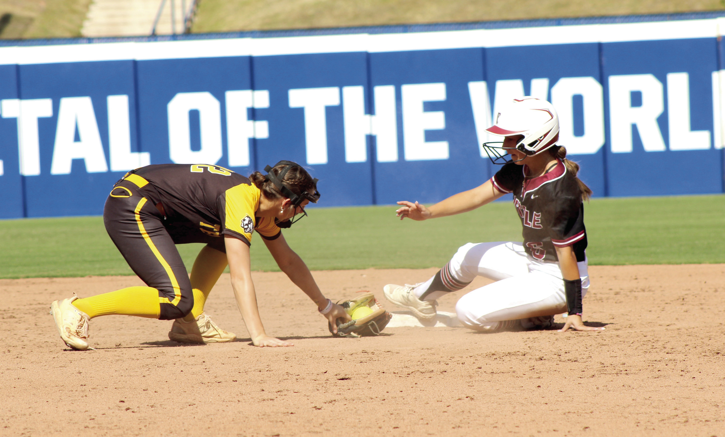 Tecumseh senior Cadence Leba recovers her glove after making the catch at second base in the sixth inning of the Class 4A Fast Pitch State Quarterfinal game against Tuttle, held at Devon Park in OKC on Oct. 16. The Lady Savages lost, 0-5, but ended the season ranked sixth with a 29-10 record. Photos by Natasha Dunagan, Countywide &amp; Sun