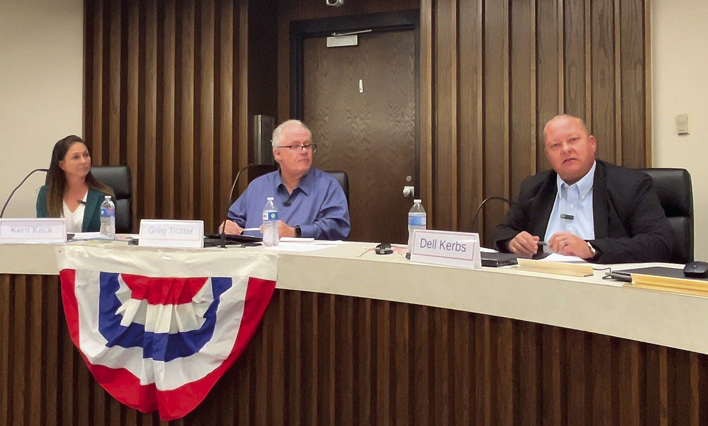 Rep. Dell Kerbs (right) addresses the audience during the forum held by the Pottawatomie Advocates for Voter Education (PAVE). Candidate Kerri Kerbs (le_) and PAVE moderator Greg Trotter (center) listen intently. Countywide &amp; Sun/Suzie Campbell