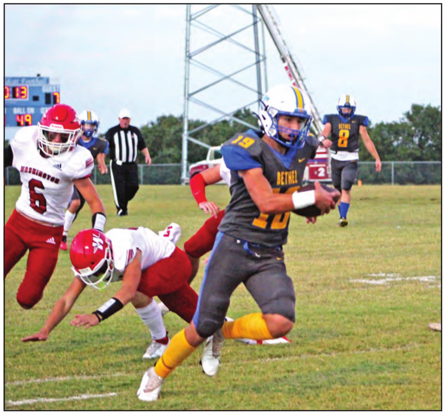 Bethel senior John Gordon carries the ball and dodges Washington players during the Homecoming Game on Oct. 1. After four straight wins, Bethel lost 18-56. Countywide &amp; Sun/Natasha Dunagan