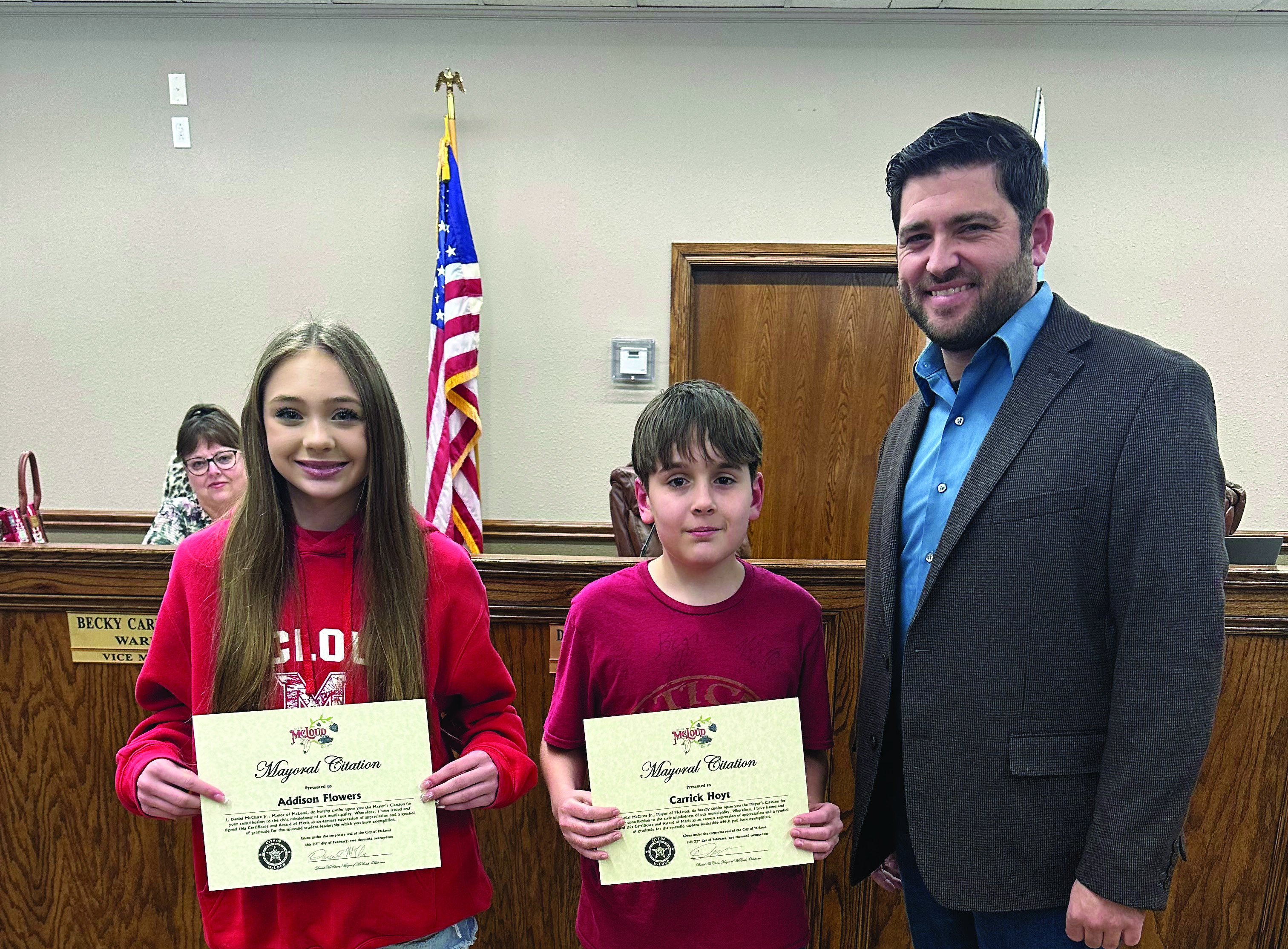 Addison Flowers (left) and Carrick Hoyt (right) of McLoud Public Schools were each presented a Mayoral Student Citizen of the Month Citation by Mayor Daniel McClure during the monthly meeting of the McLoud City Council Thursday, Feb. 22. Photo provided