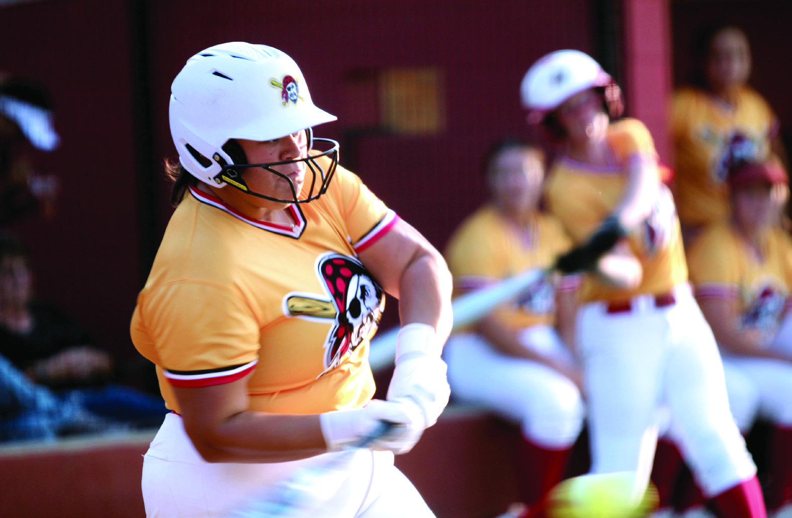 Dale senior Kelby Welcher makes contact at bat during the Dale-Tecumseh Fast Pitch Tournament game against Purcell on Sept. 4. The Lady Pirates won four of the five games they played during the three-day tournament. Natasha Dunagan, Countywide &amp; Sun
