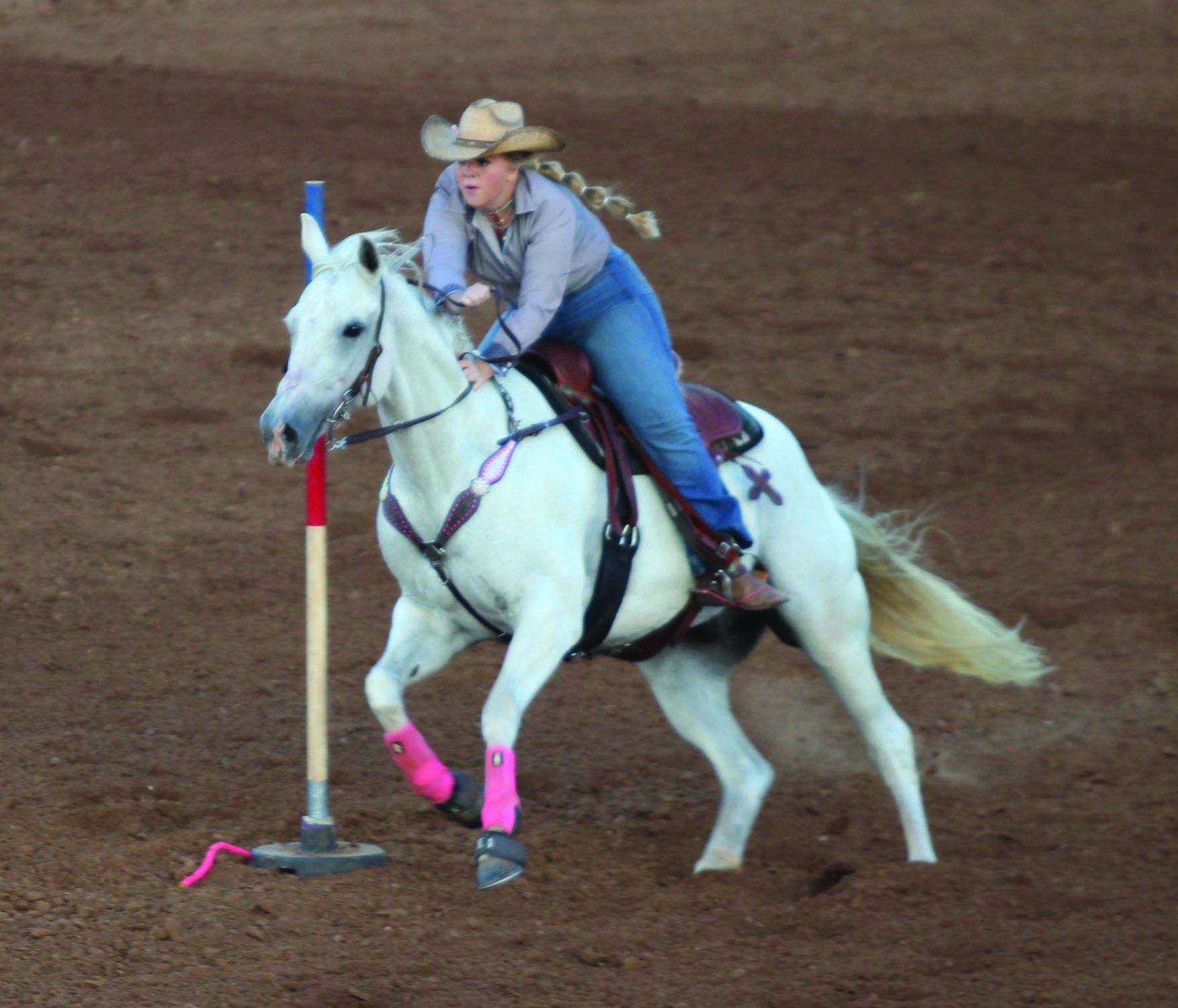 Josey Milburn of Asher competes in Pole Bending during the International Finals Youth Rodeo on the evening of July 7. Natasha Dunagan, Countywide &amp; Sun