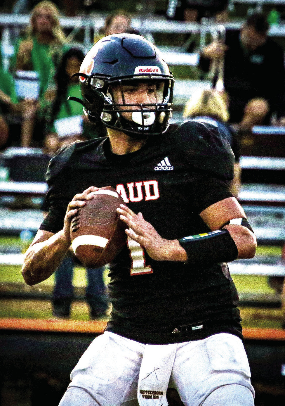 Maud sophomore Trenton Marshall looks for an opening to pass during the home game against Quinton on Sept. 19. The Tigers lost, 0-46. Photo courtesy of Samantha Guinn