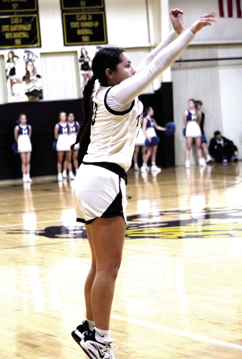 Tecumseh junior Jadyn Wilson tries for three points during the third quarter of the home game with Harrah on Feb. 10. The Lady Savages won, 55-44, and the Savages also won that night, 71-51. Countywide & Sun/Natasha Dunagan