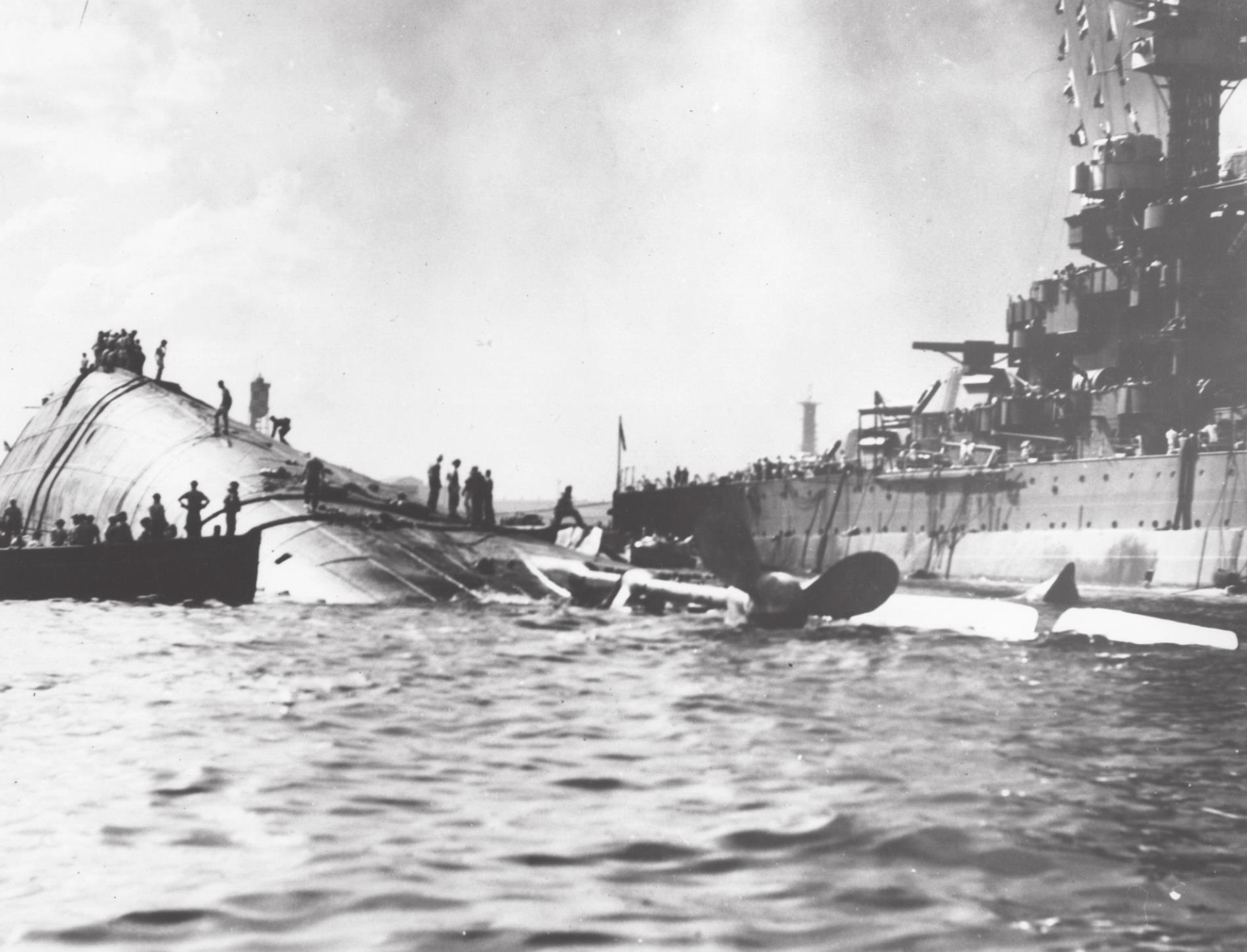 USS Oklahoma capsized next to the USS Maryland. Photo provided