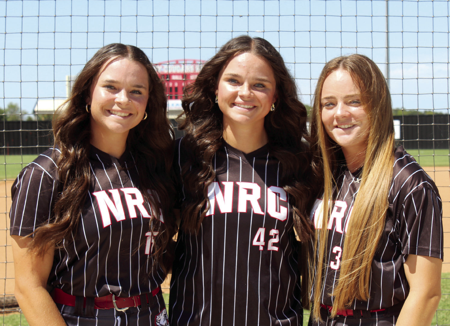 Triplets Morgan Campbell, Sarah Campbell and Molly Campbell are the only seniors on the North Rock Creek Lady Cougars Fast Pitch Team this season. They are shown here posing during the NRC Media Day on Aug. 16. Countywide &amp; Sun/Natasha Dunagan
