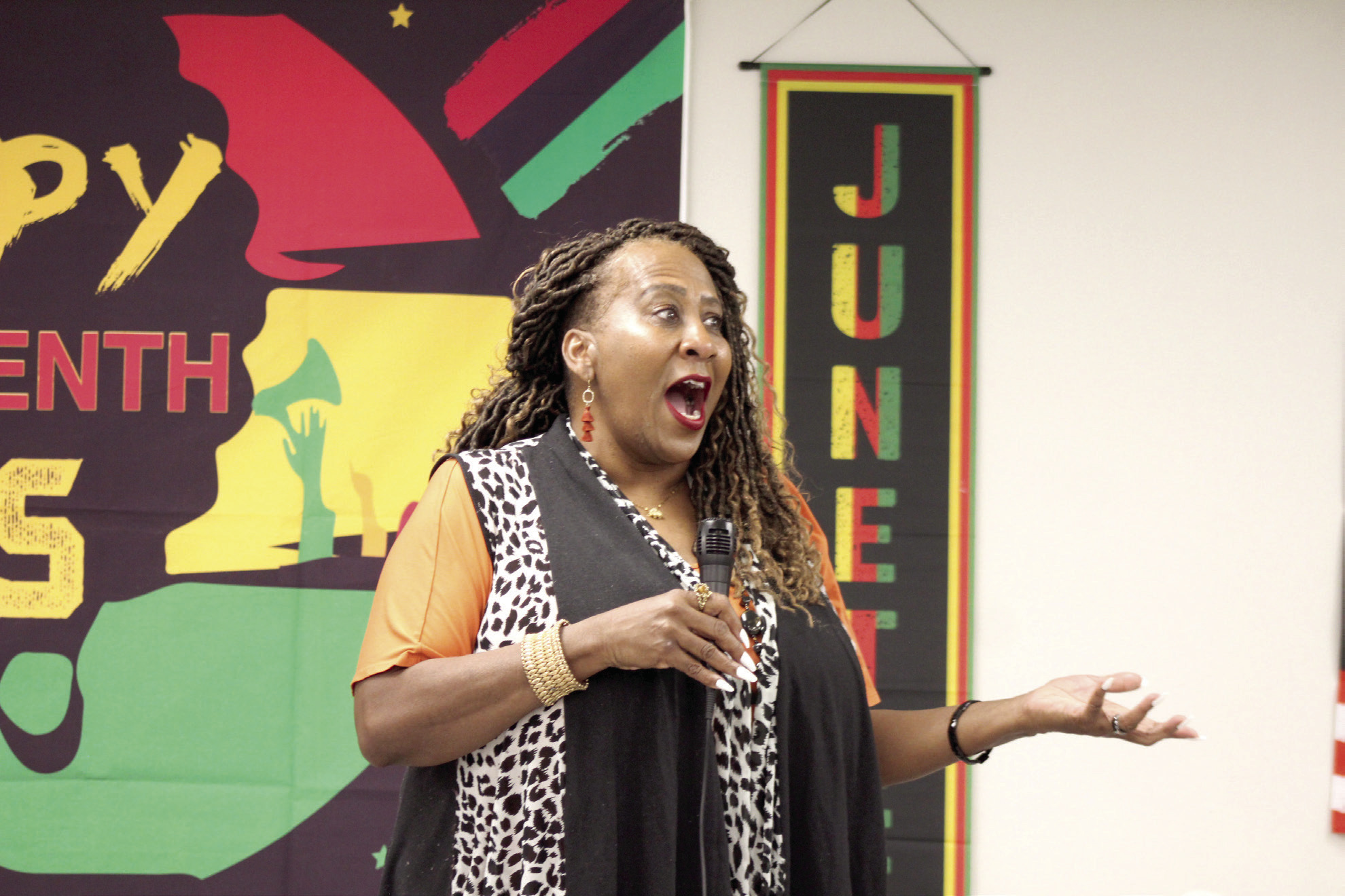 During the Dunbar Heights Community Group Juneteenth Celebration, 'An Evening of Legacy &amp; Light,' Anice Young speaks and sings about growing up in the Dunbar Heights neighborhood on June 17 at the Shawnee Communtiy Center. Natasha Dunagan, Countywide &amp; Sun