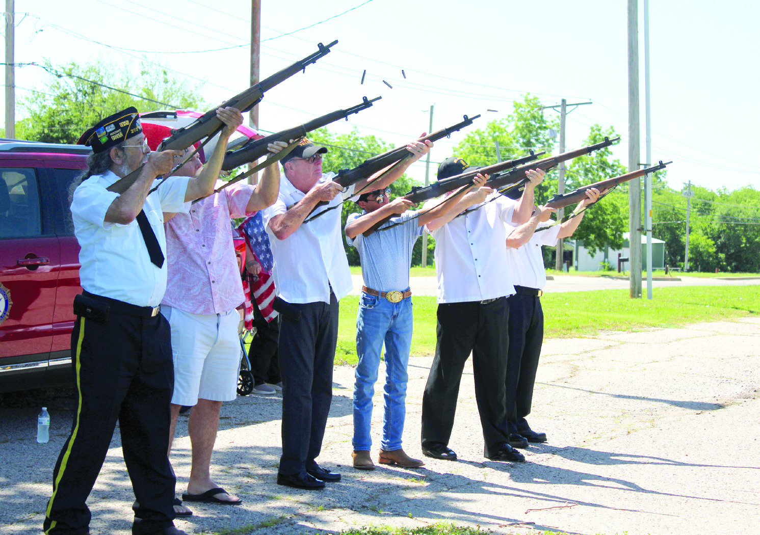 An honor guard led by members of the American Legion Post 260 gives an 18-gun salute during the Memorial Day service at Tecumseh Cemetery on May 27. There were also wreaths placed for each military branch and the emergency responders. Rev. Paul Fletcher, with Northridge Church of Christ in Shawnee, and State Senator Shane Jett spoke, as well as Post Adjutant Bill Gammage. Shown, from left, are Gammage, Fletcher, Vice Commander Alynn Stewart, Abraham Seper, CSM George Seper and Chaplain Stuart Rose.