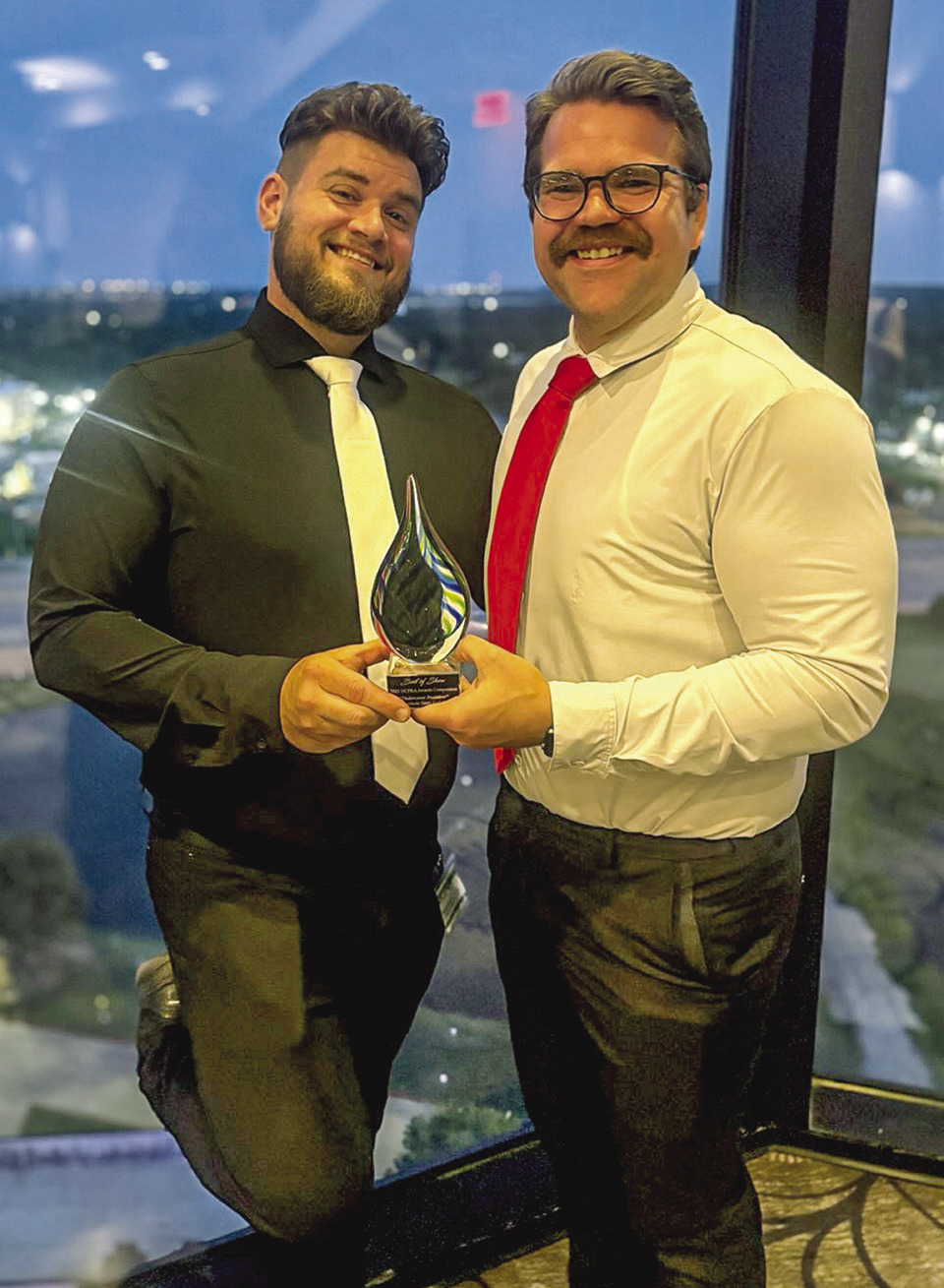 SSC Web and Multimedia Coordinator Brooks Nickell (left) and SSC Director of Communications Josh Hutton (right) won Best of Show at the 2025 Oklahoma College Public Relations Association Annual Conference on July 14 at the Hard Rock Casino and Hotel in Catoosa. The award-winning entry “Undercover President” was written by Hutton and filmed and edited by Nickell. Photo Provided