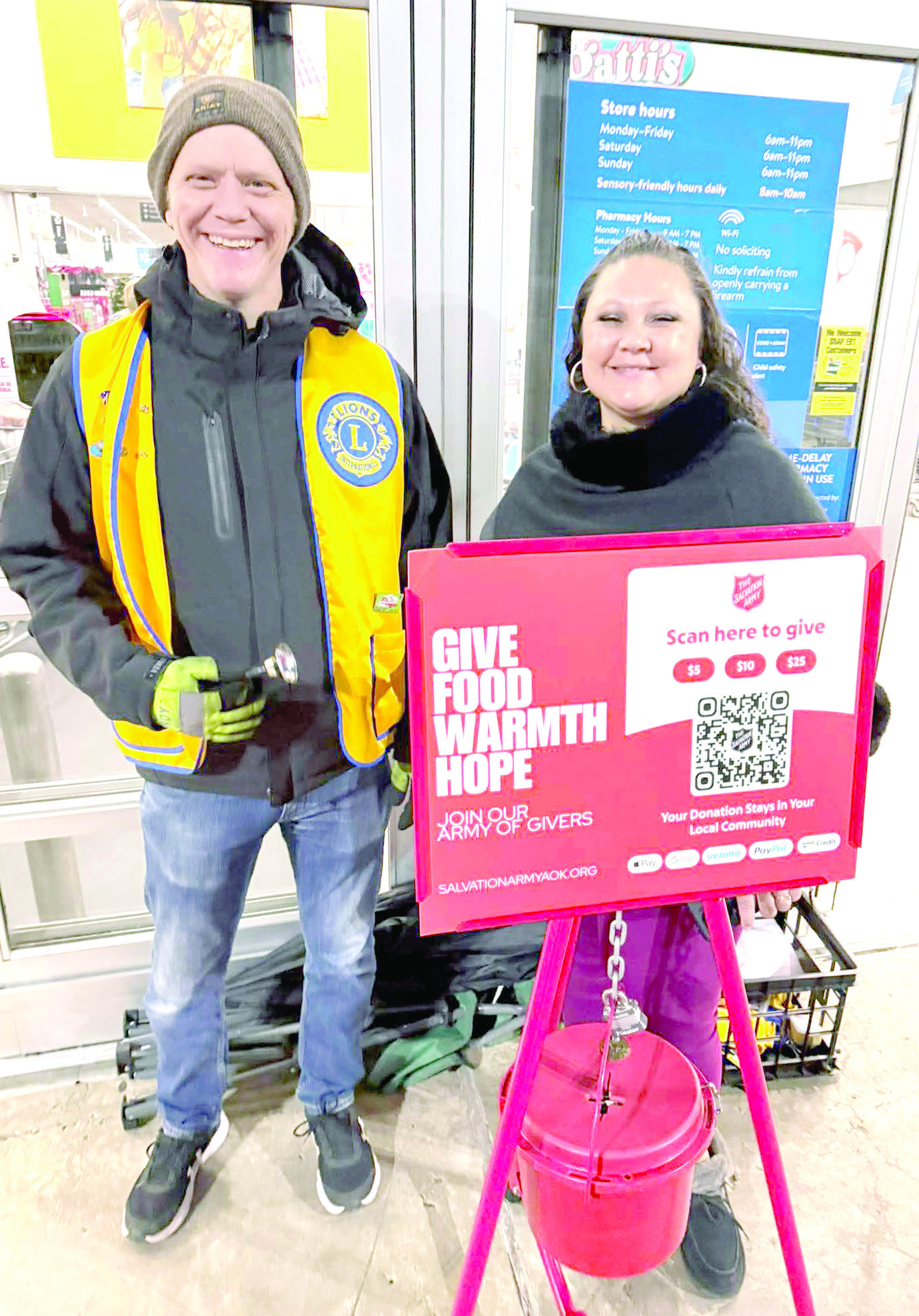 Clay Dodgion, with wife Jamie, supports The Salvation Army by volunteering as bell ringers. Photo provided