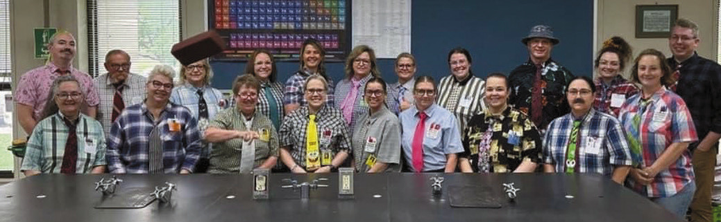 Teachers and staff at Tecumseh High School dressed like the late Merle Hunsaker, Jr. - a longtime science teacher who dressed in dress shirts, wild ties, glasses and ponytail - and one of them threw a rubber brick. This photo was taken during the Battle of the Buildings, a competition which happens at the end of the school year. Photo courtesy of Iva Bingham.