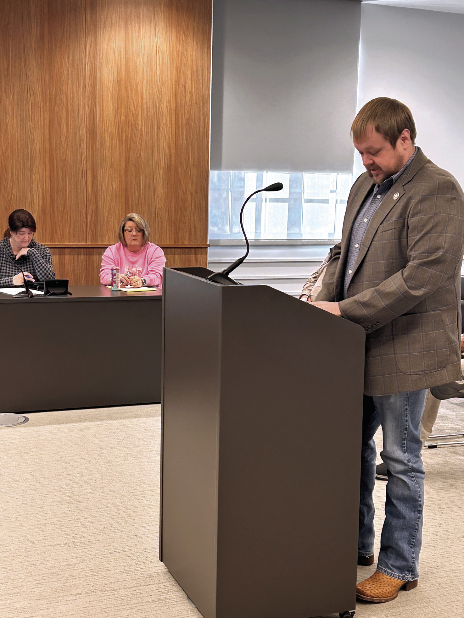 McLoud City Manager Cody Roe addresses the Commissioners, requesting reimbursement for an ARPA-funded project. Suzie Campbell, Countywide &amp; Sun