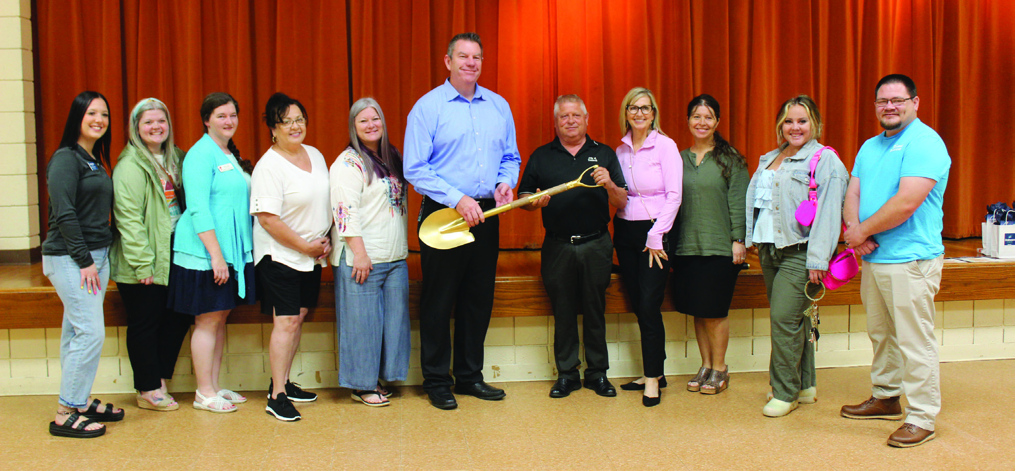  Dobson Fiber, out of OKC, held a groundbreaking ceremony at Tecumseh City Hall Auditorium on May 16. They were represented by Chief Strategy Officer Jim Horsburgh, center left holding shovel with Tecumseh City Manager Jimmie Stokes; Director of Business Operations Heather Durham, third from right; and Director of Marketing Ali Clark (not shown), who spoke at the event. Dobson Fiber is currently laying lines throughout Tecumseh in order to offer residential service. They already offer business service.