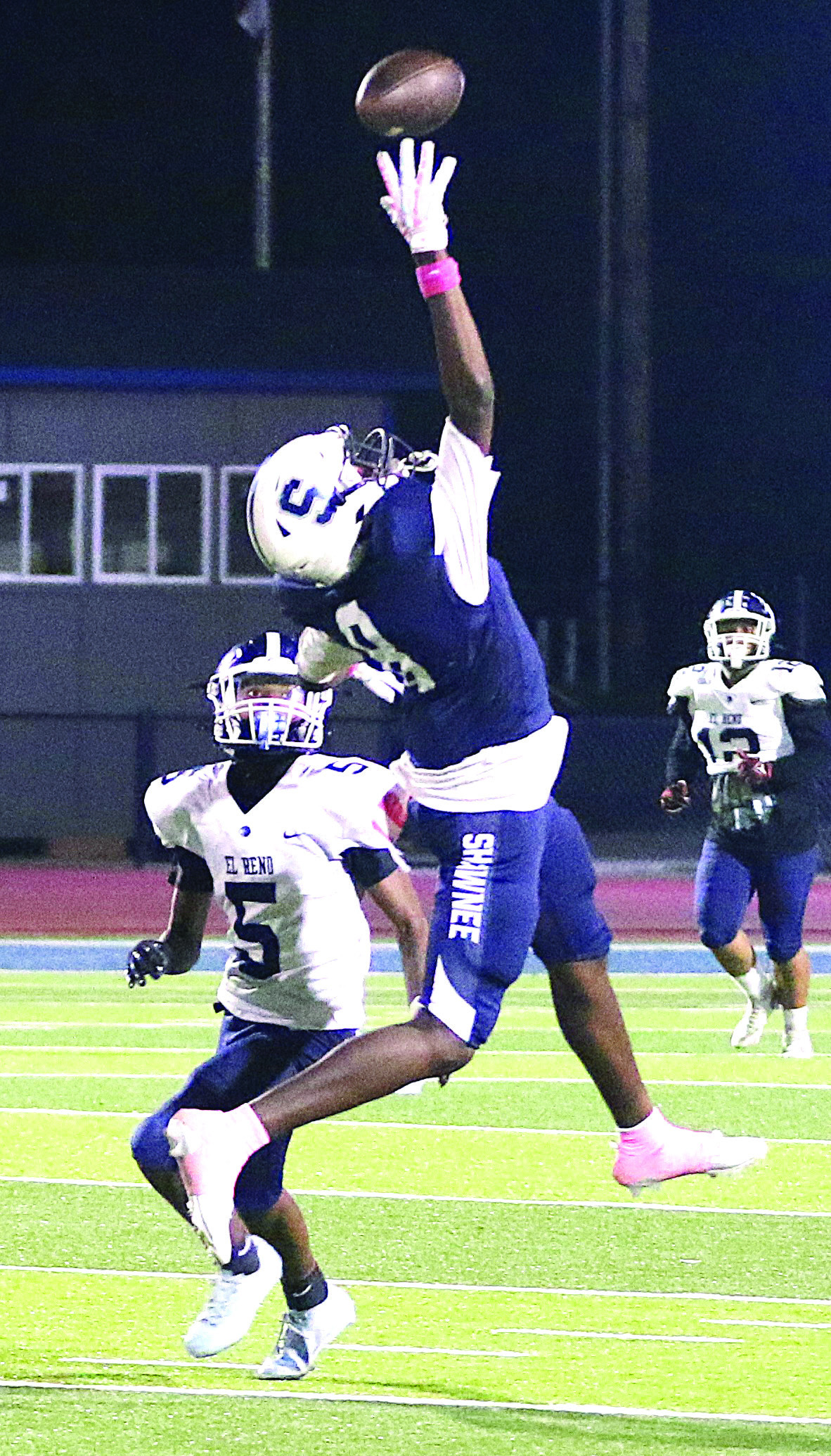SHS receiver Brendon Johnson goes up high on a reception attempt against El Reno in the Wolves’ 49-20 win. Photo courtesy of Kent Bush