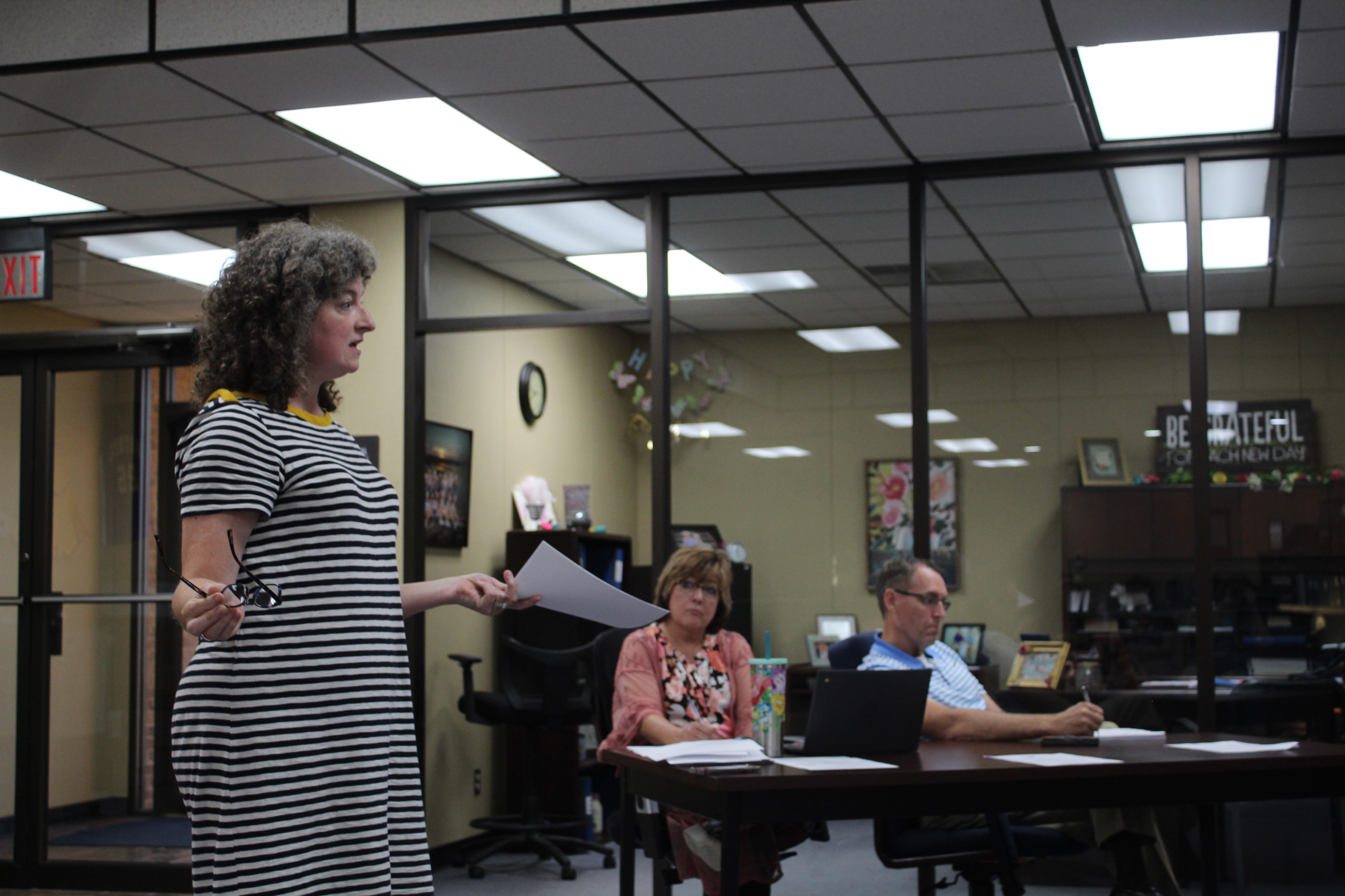 Bethel Teacher Alicia Gardner speaks to the Bethel Board of Education during the meeting on Aug. 8, as Minutes Clerk Denise Flowers and Superintendent Dr. Matt Posey listen. Countywide & Sun/Natasha Dunagan
