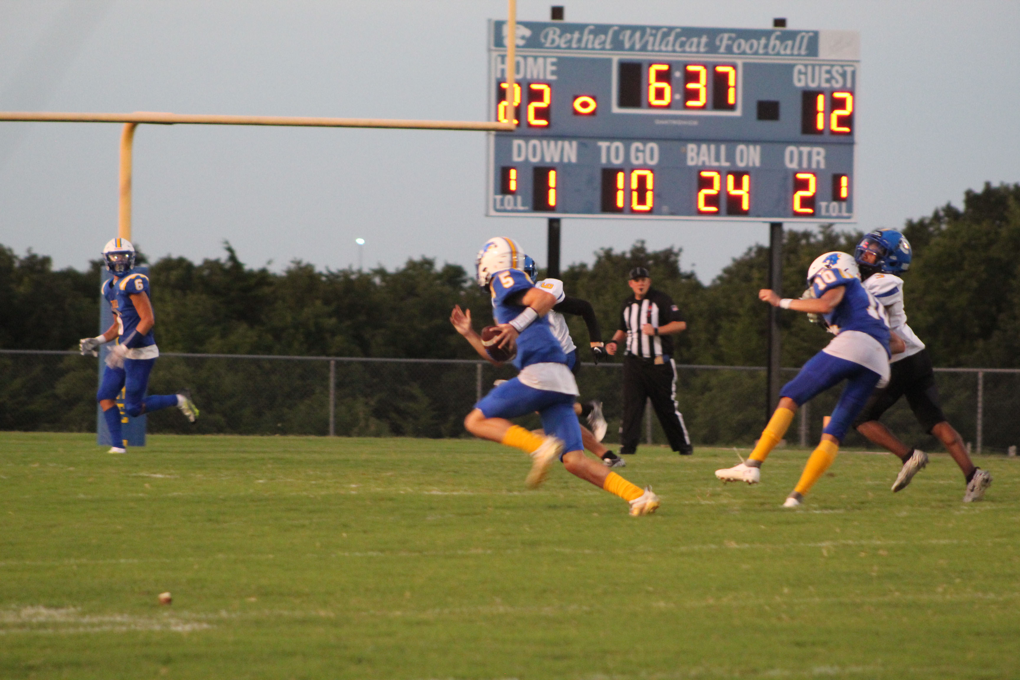 Bethel sophomore Bryce Tapley (#5) runs the ball, as junior Reagan Curry (#10) blocks a Classen SAS player during the season opening home game on Sept. 2. Bethel won 43-12. Countywide & Sun/Natasha Dunagan