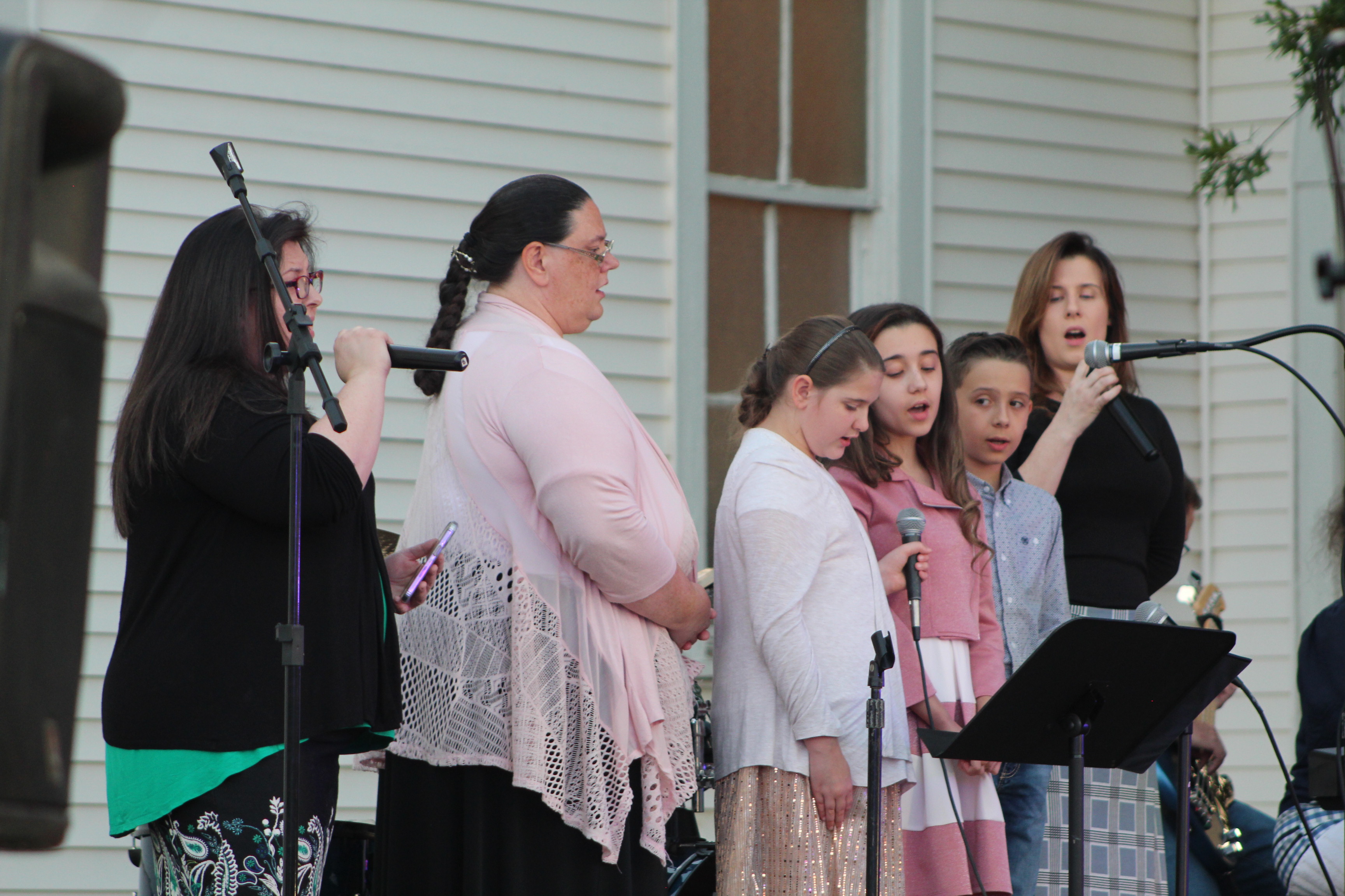A group from Holiness Church sings "It Only Takes One" during the Frontier Days Gospel Sing at Broadway Chapel, in Tecumseh, Sept. 15. Four groups and two individuals from area churches participated in the Gospel Sing. Countywide & Sun/Natasha Dunagan