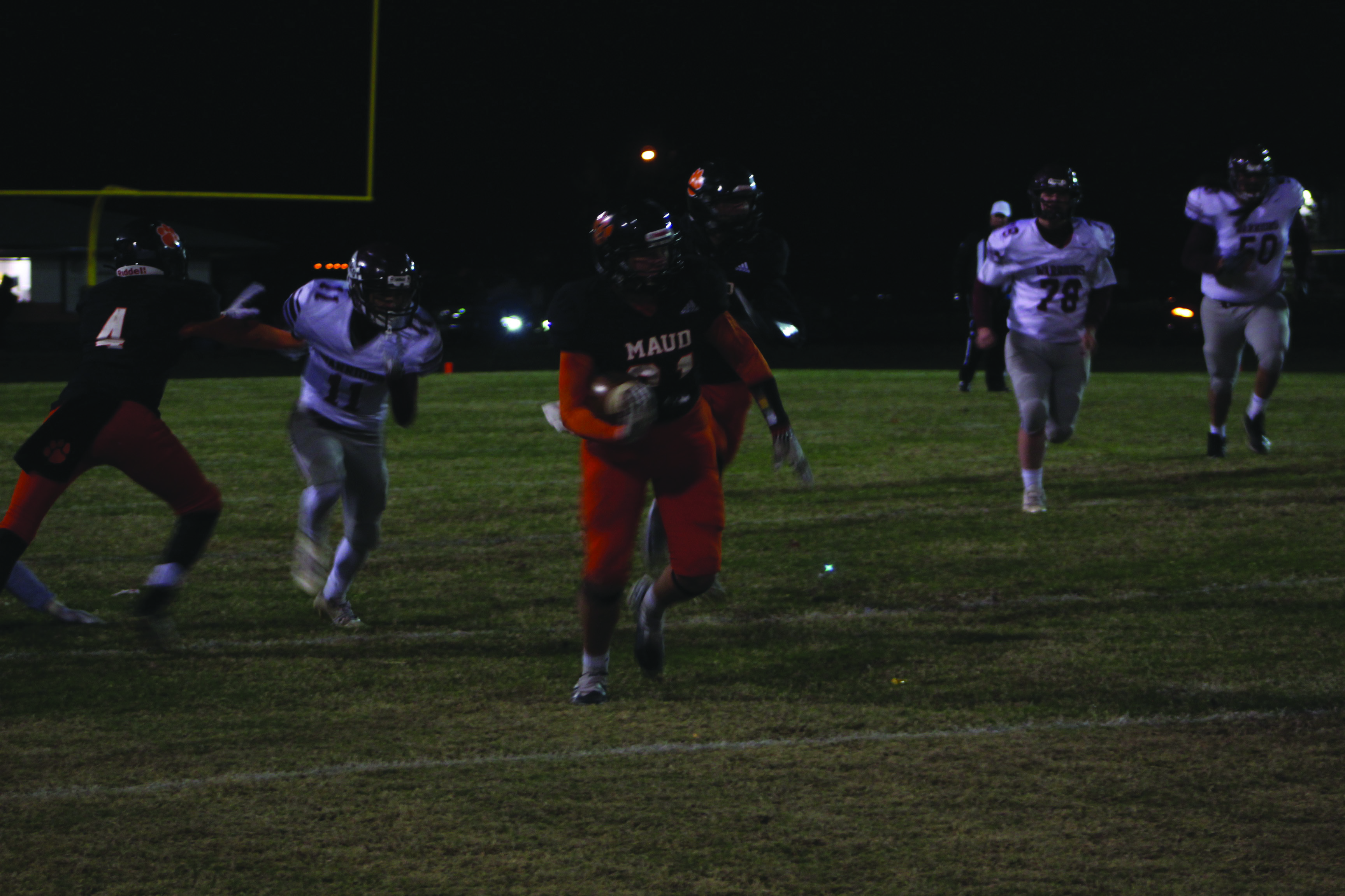 Maud freshman Beau Willis carries the ball during the Class C first-round playoff home game against Oaks Mission on Nov. 11. Maud won their 11th straight game, and it was called at half time, 60-8. Countywide & Sun/Natasha Dunagan