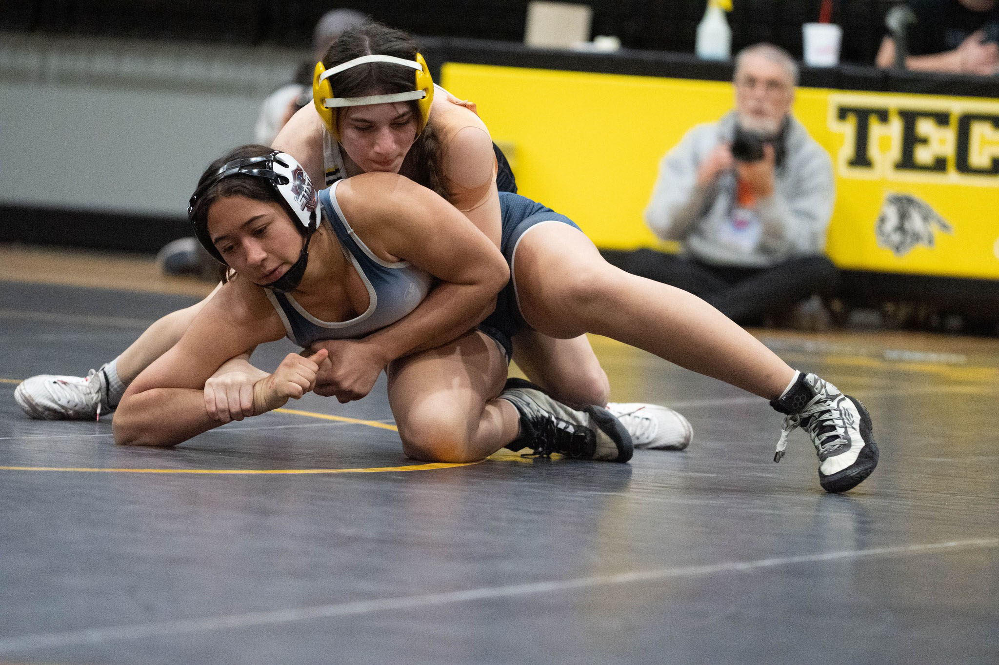 Tecumseh's Trinity Rakestraw works on pinning Shawnee's Za’Karia McClain in the Tecumseh match on Feb. 9. Photo provided by Kenetta Lisenbee.