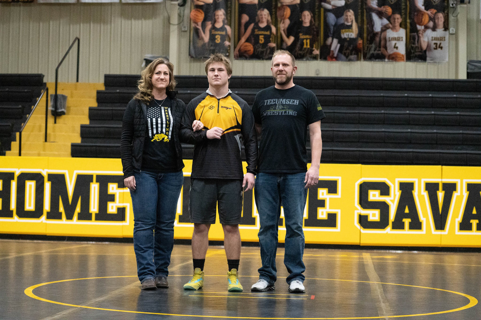 Tecumseh senior Hunter Hadsall poses with his family during Wrestling Senior Night ceremonies on Feb. 9. Photo provided by Kenetta Lisenbee.