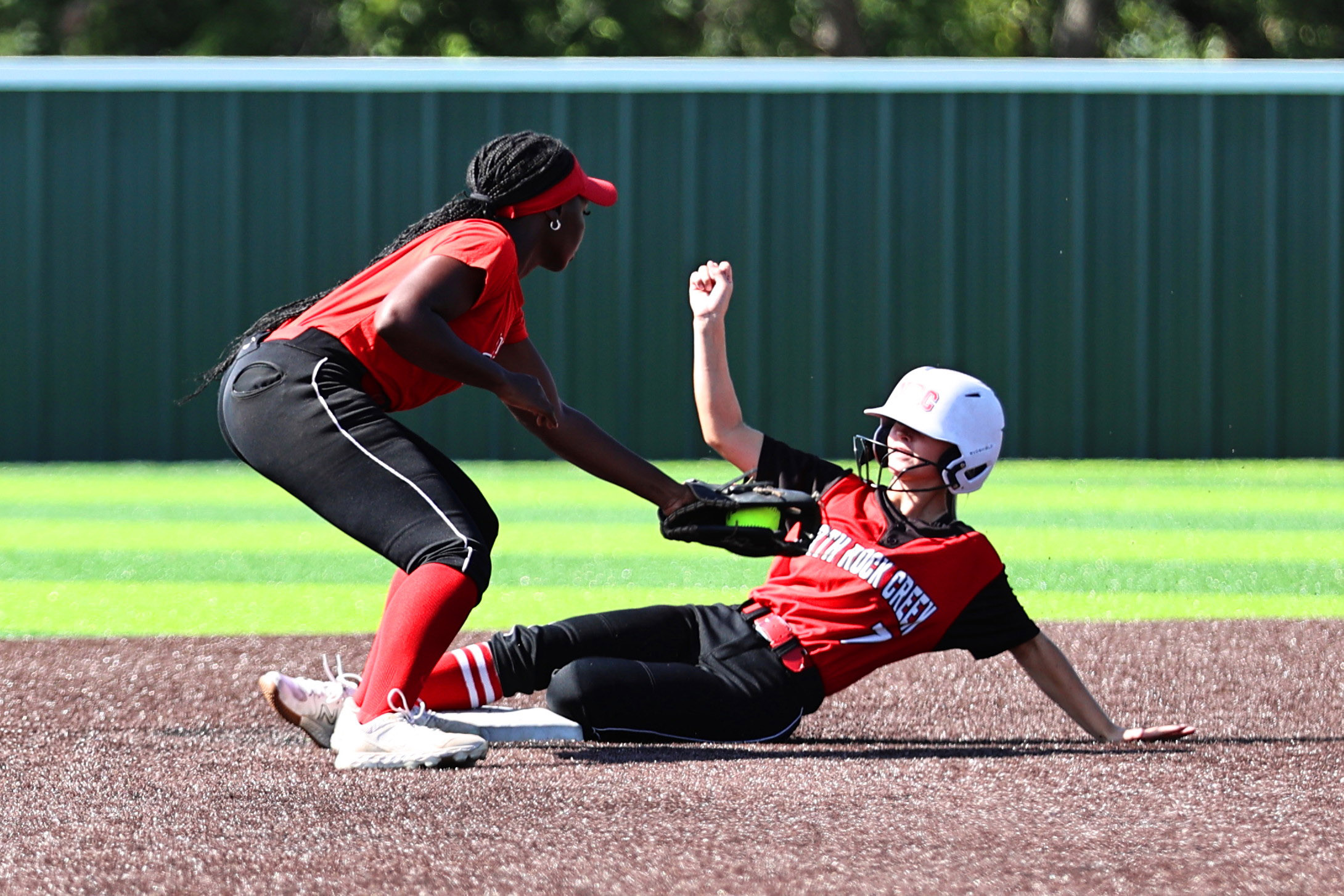 North Rock Creek's Lainey Joyner slides in safe at second during a home scrimmage held Friday, Aug. 4 again.st 6A Westmoore. The game ended in a 2-2 tie. Photo courtesy of Gowin Photography