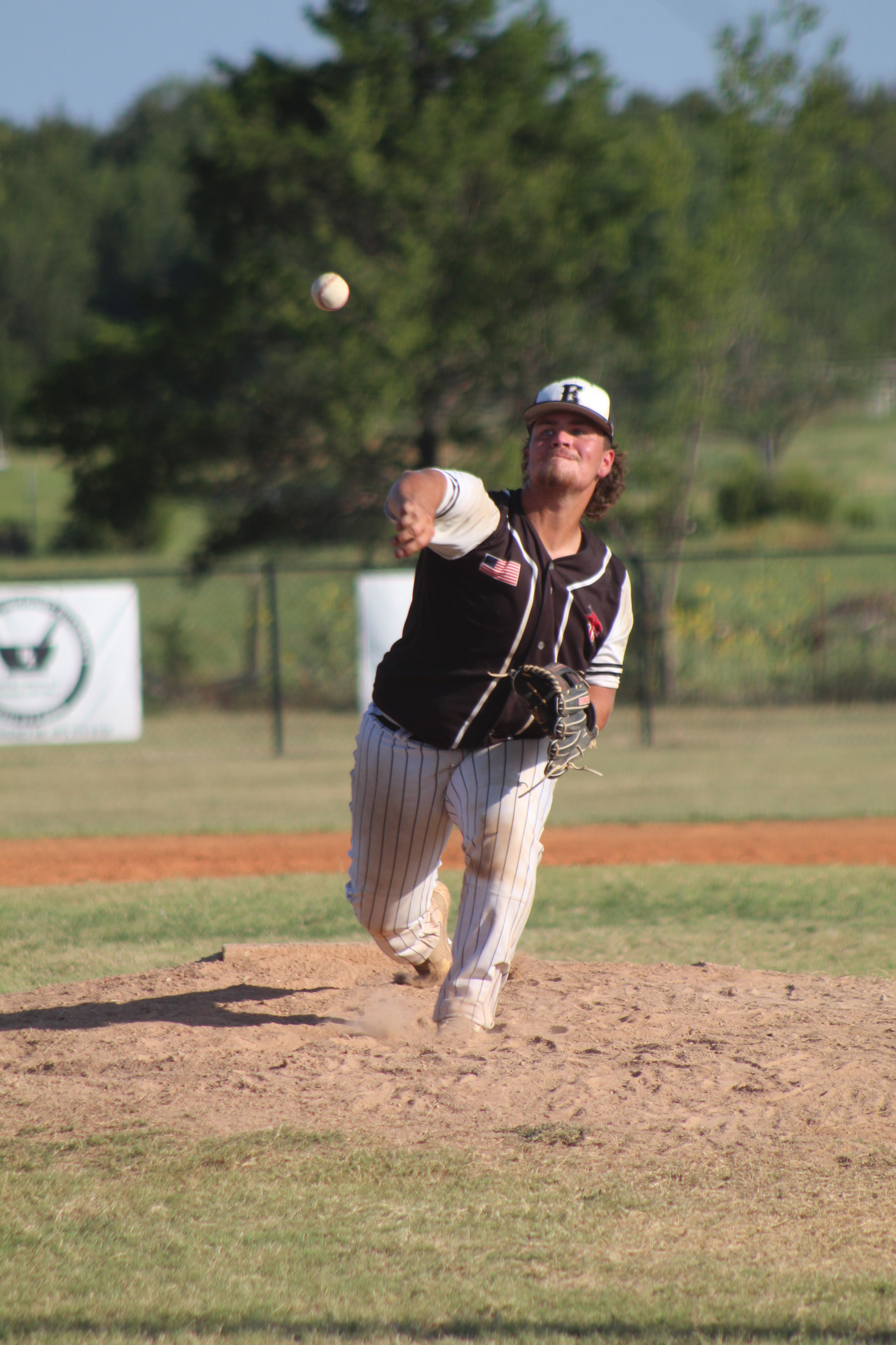 Earlsboro junior Jon Nice throws a curve during the home game on Sept. 7 against Wellston. Wellston won, 12-0. Countywide & Sun/Natasha Dunagan