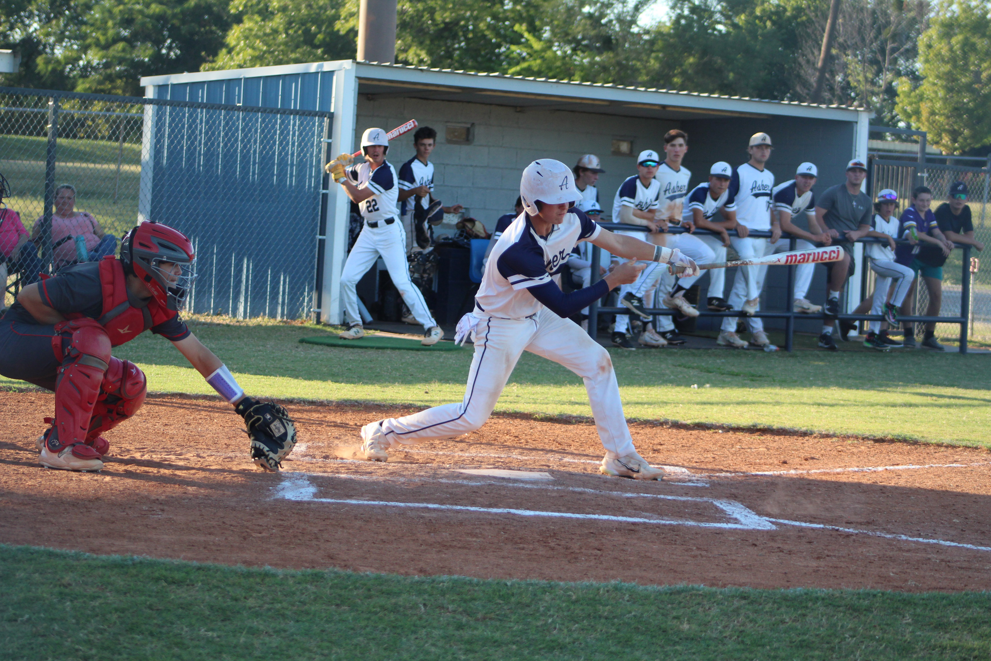 Asher junior Kelby Fowler hits a double in the third inning of the Sept. 25 home game, as Dale senior Ethan Douglas watches. The Indians lost to Dale, 9-15, but they won their Class B Regional Tournament on Sept. 28-29, beating Hammon twice and losing once to Calumet. Asher advanced to the State Quarterfinals on Oct. 5 at Edmond Santa Fe High School and lost to Ft. Cobb-Broxton, 2-12. The Asher Indians end their season with a record of 16-14. Countywide & Sun/Natasha Dunagan