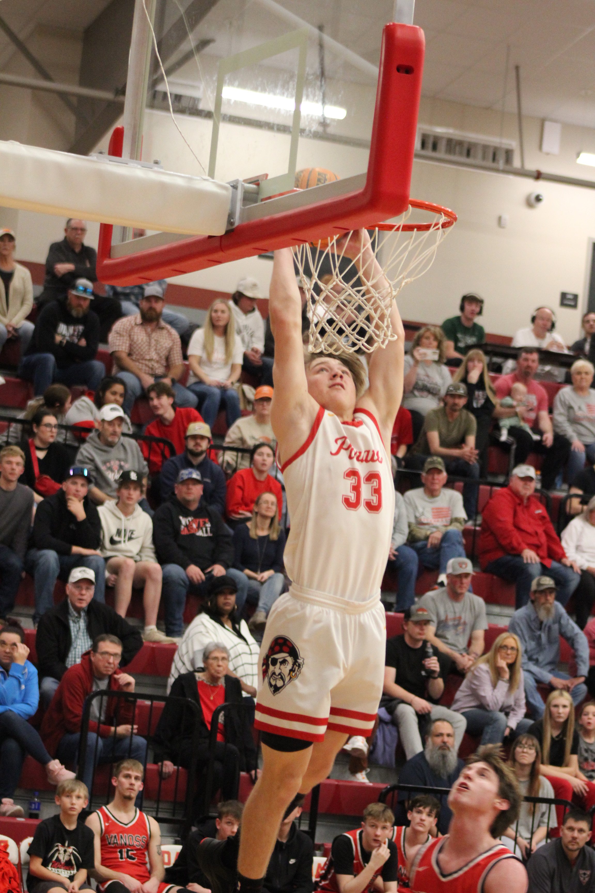 Dale senior Dayton Forsythe grabs the rebound and slam dunks it during their last regular season home game, with Vanoss on Feb. 6. The Pirates won, 68-35, and have a record of 22-2. Countywide & Sun/Natasha Dunagan
