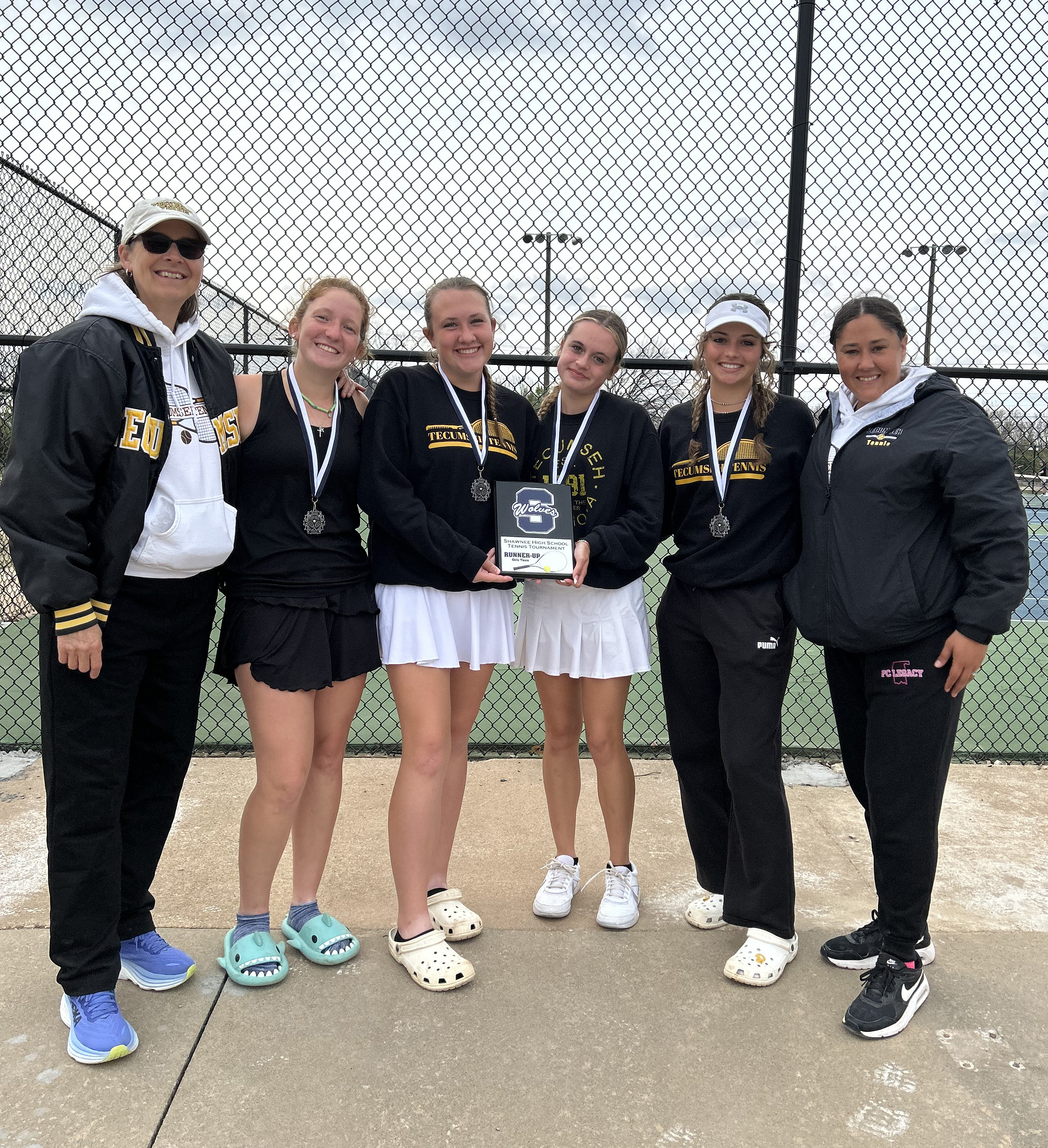 The Tecumseh High School Girls Tennis Team received second place, out of eight schools, in the Shawnee High School Tennis Tournament on March 15. The girls played at OBU, and the boys played at SHS. Shown, from left, are Head Tennis Coach Jennifer McKnight, Laycee Thoma, Lili Lowden, Kalyn Bartmess, Kyann Sells and Assistant Tennis Coach Megan Laughlin. Photo provided.