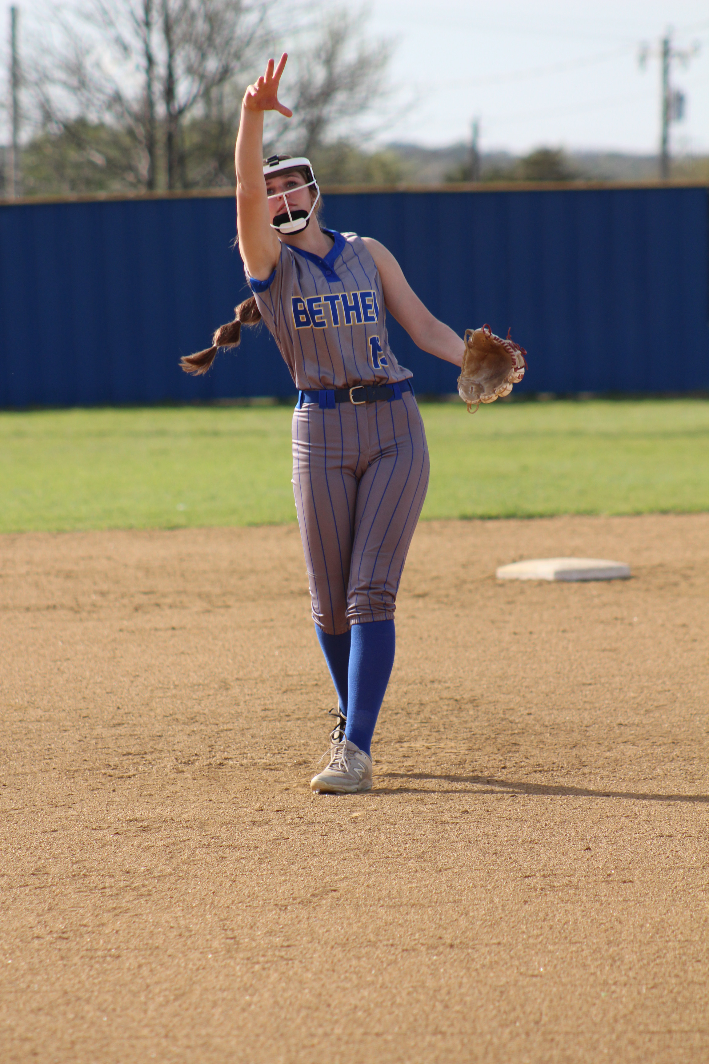 Bethel's Kinley Anthony lobs a pitch over home plate during the slow pitch double header with Davenport on April 8. The Lady Wildcats won both games, 12-0 and 10-0. Countywide & Sun/Natasha Dunagan