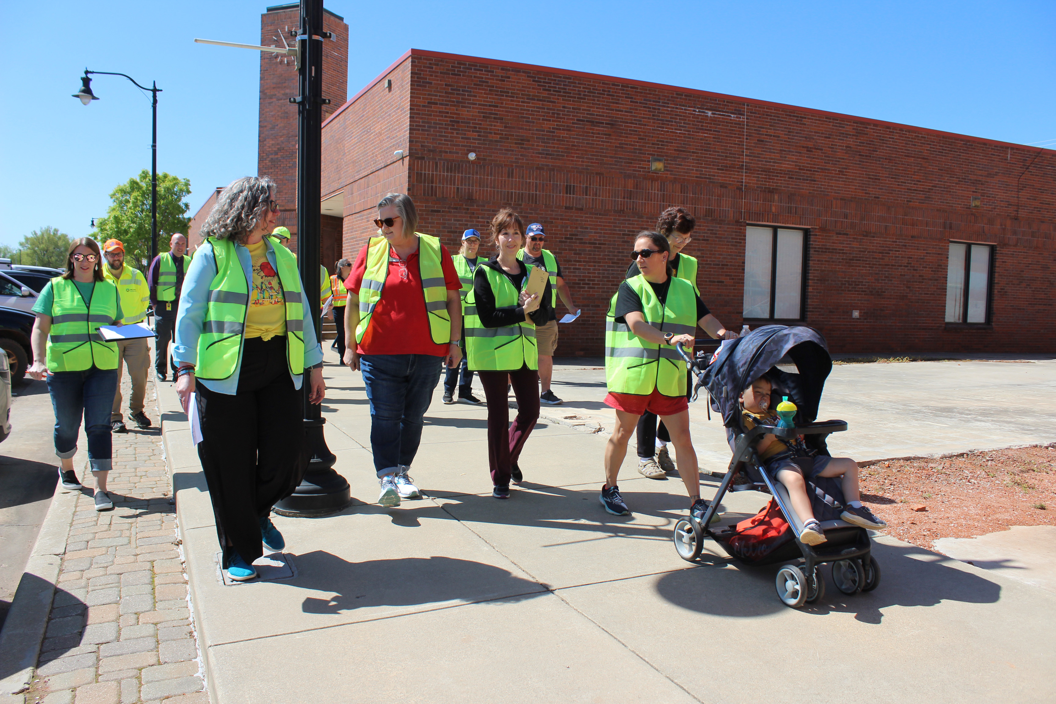 Residents, local leaders and others set out from Tecumseh City Hall on the Tecumseh Walking Audit for first-hand experience walking the streets of T-town and to recommend improvements on April 12. They were led by Holly Gordon, from the TSETHealthy Living Program, fourth from left. Countywide & Sun/Natasha Dunagan
