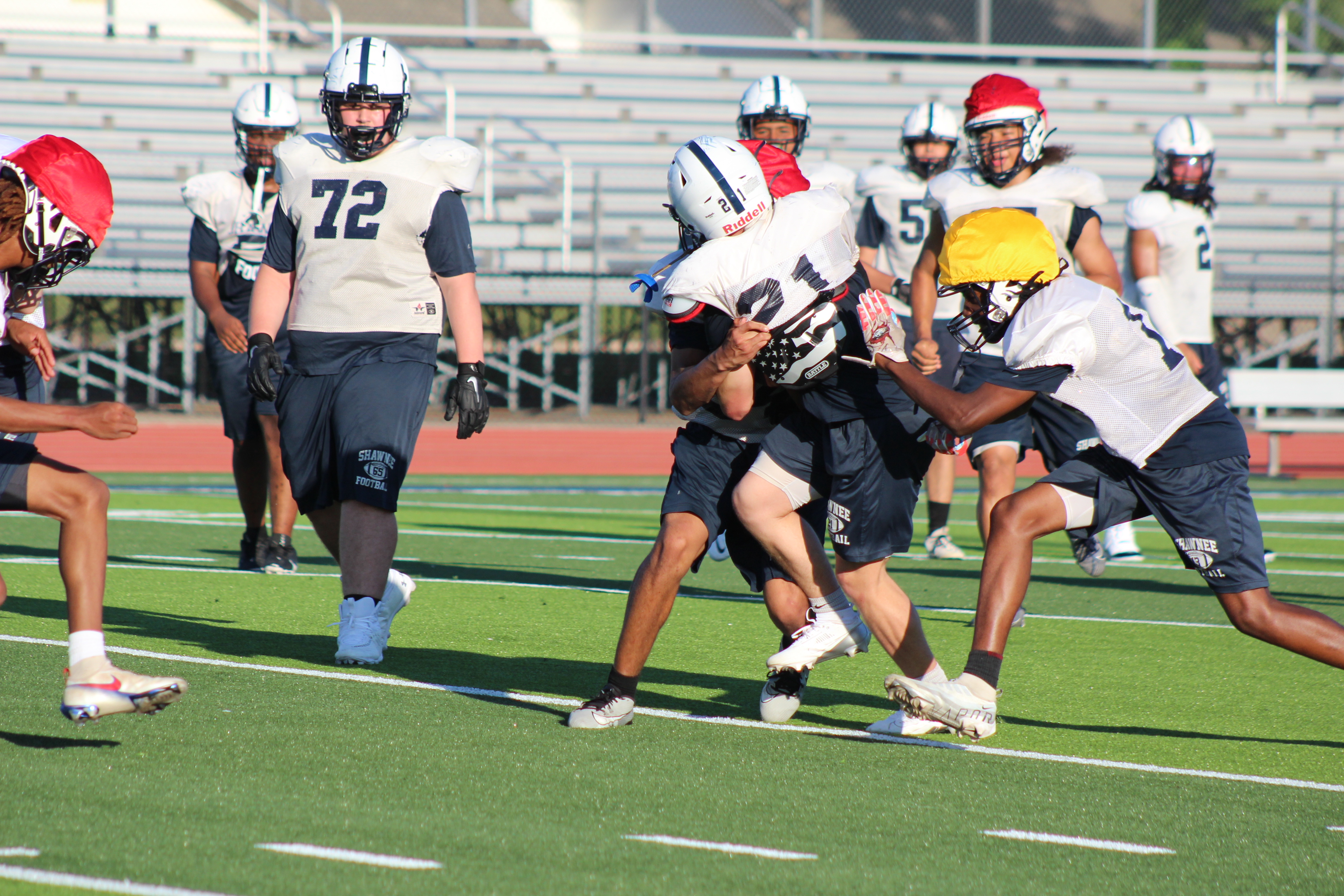 Football Wolves Play for First Time on Turf