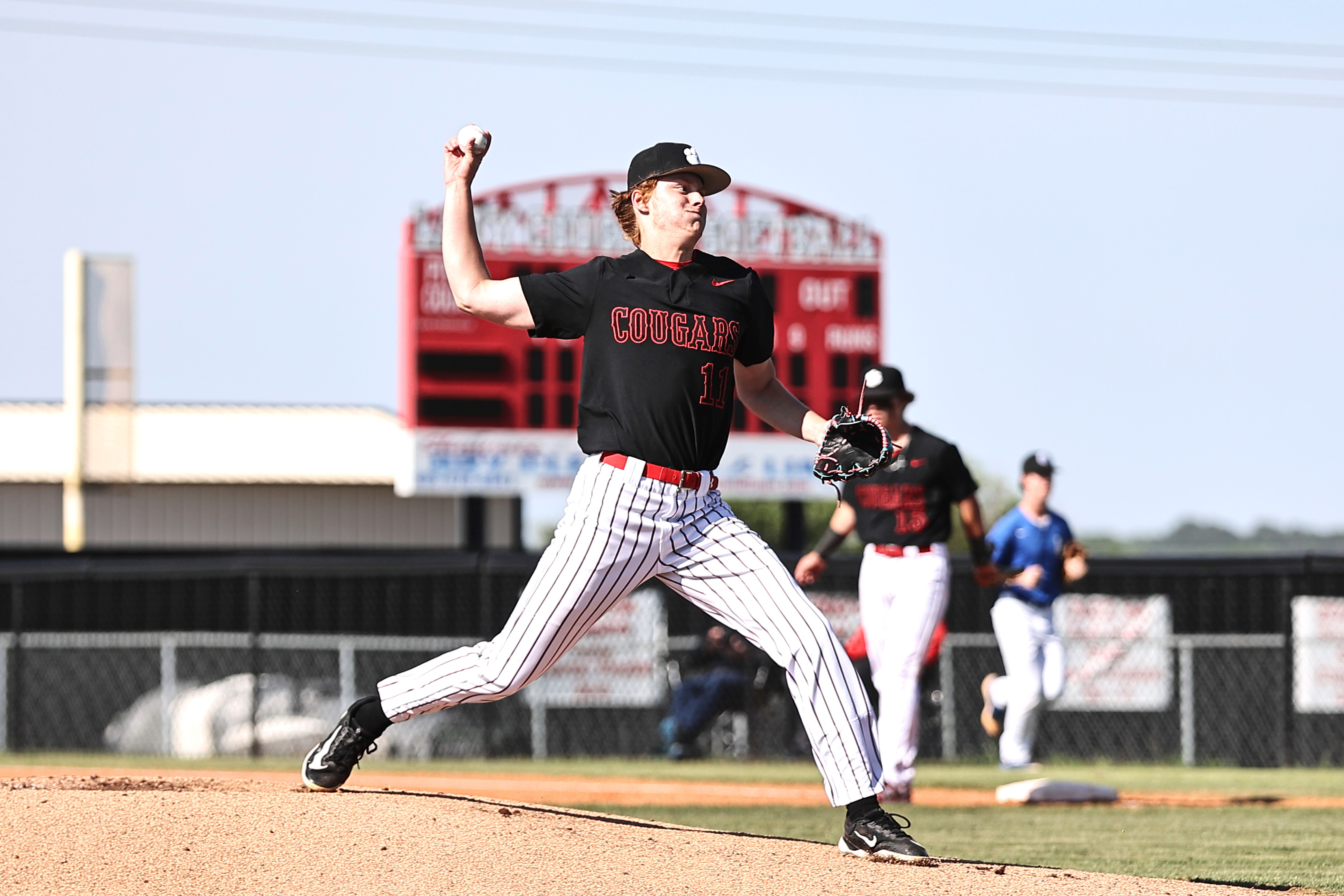 North Rock Creek's Colin Brown winds up for the pitch. 