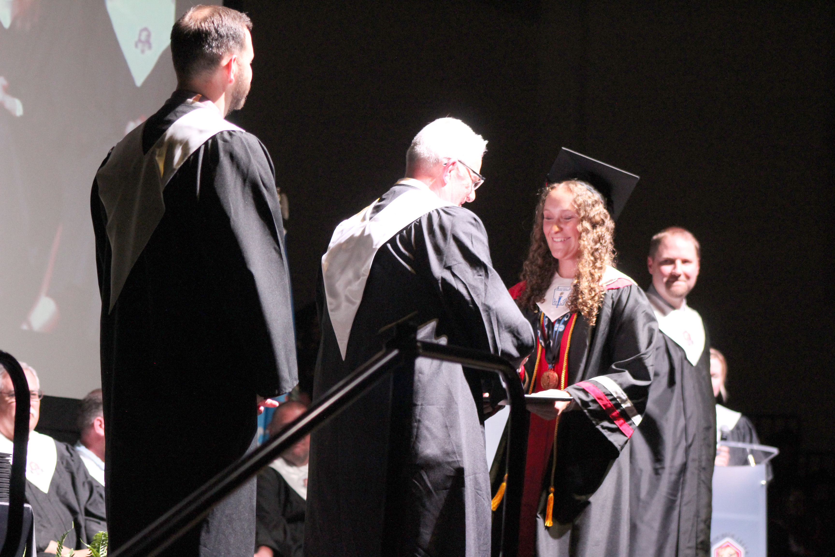 North Rock Creek Graduate Haley Hacker receives her diploma from Co-Principal Chad Brooking during graduation on May 16. NRC had 101 graduates this year. Countywide & Sun/Natasha Dunagan