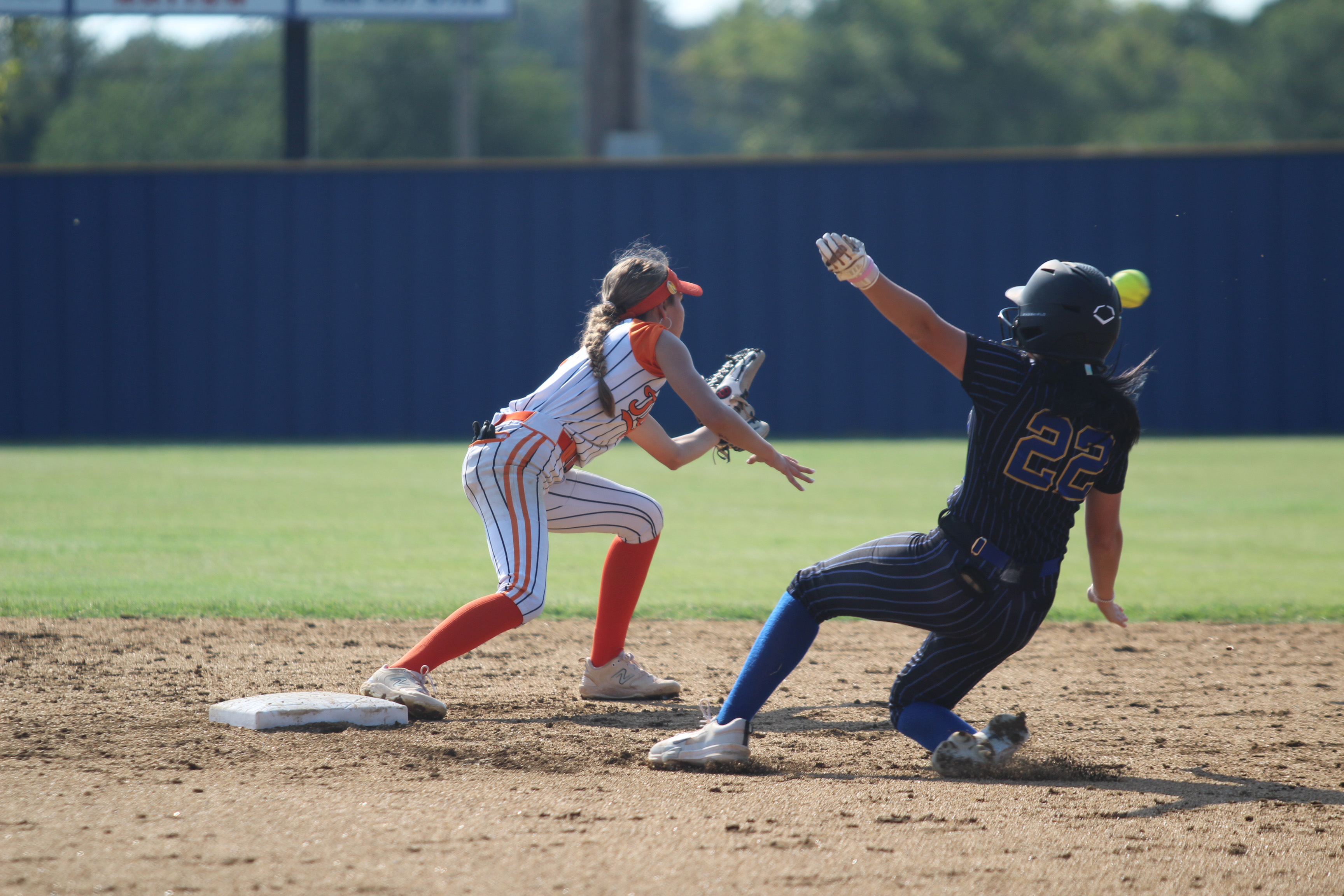 Bethel's Alexis Williams starts her slide into second as Maud's Janlee Impson waits for the catch at the Bethel home game on Aug. 12. The Lady Wildcats won by run rule, 12-0. Countywide & Sun/Natasha Dunagan