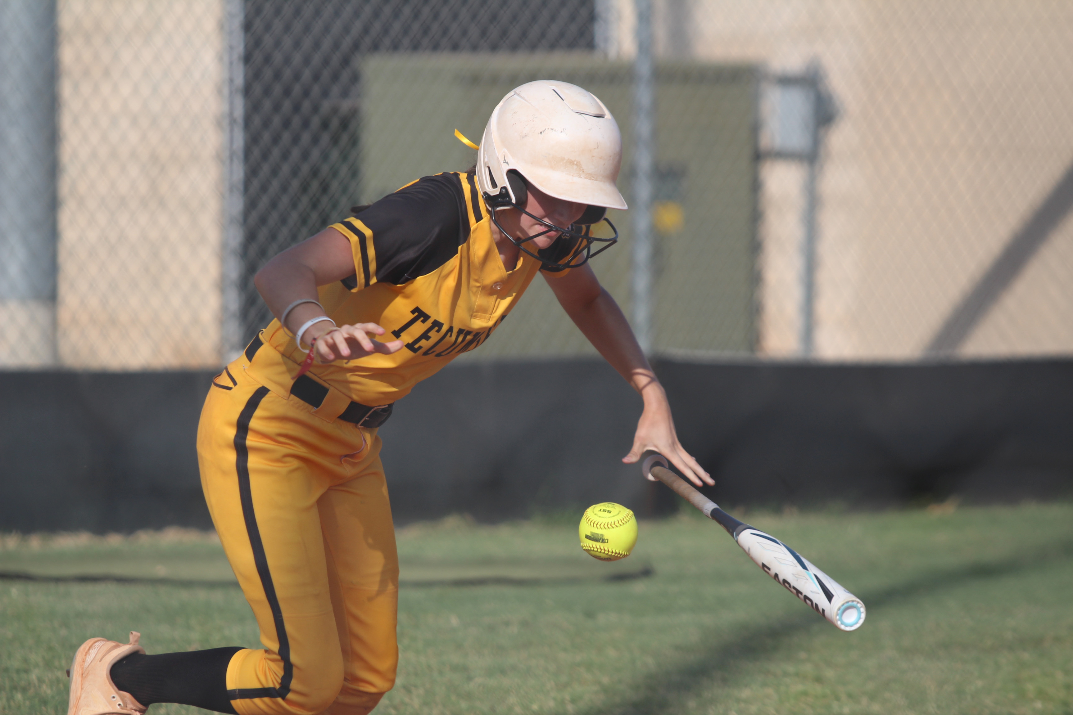 Tecumseh sophomore Madison Gray thows her bat down to run after a hit in the fourth inning of the Aug. 13 game with Cleveland. The Lady Savages won, 10-0. Countywide & Sun/Natasha Dunagan