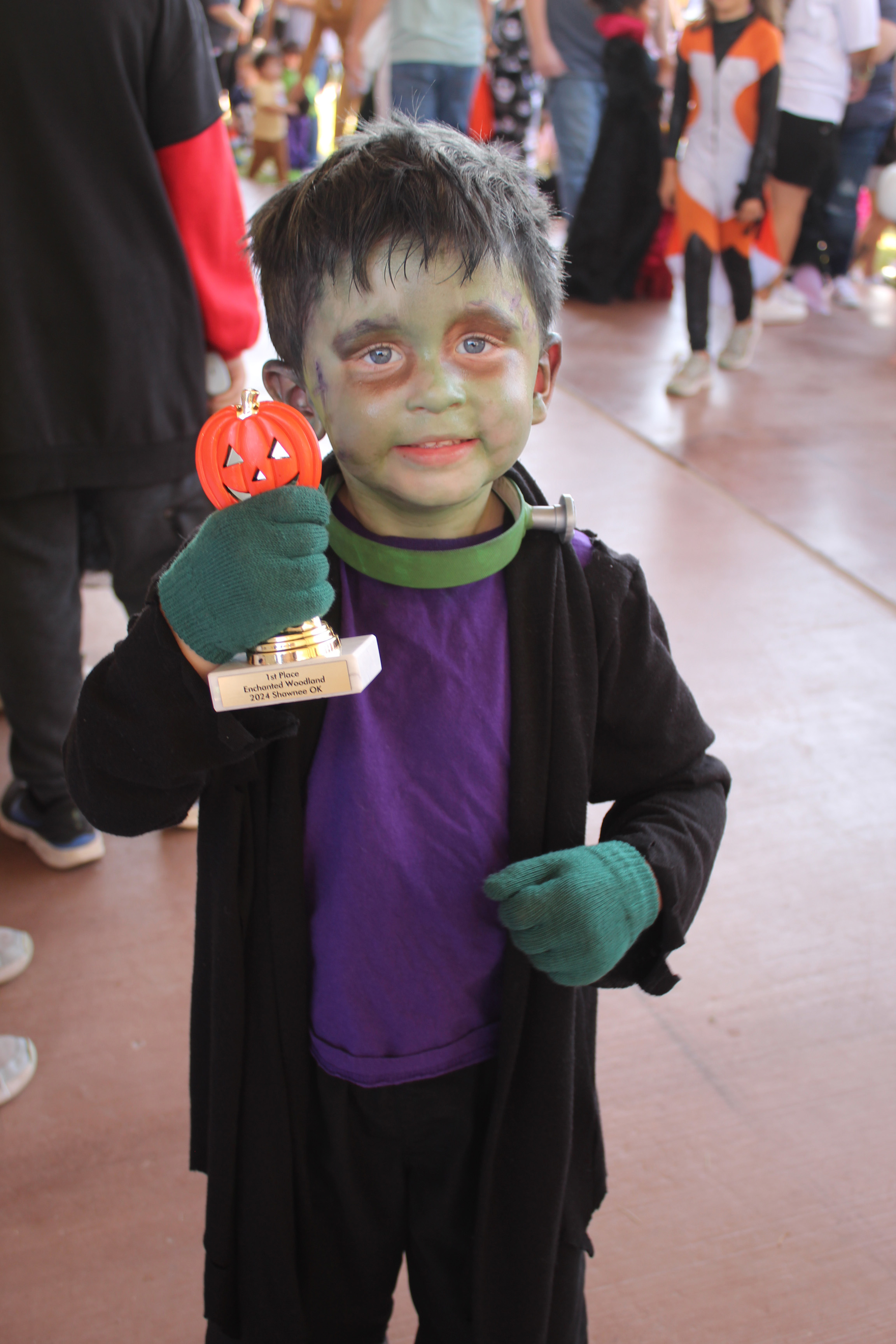 Cohen Klupenger, 4, of Shawnee, won the 5-and-Under Costume Contest during the Enchanted Woodland event, held at Woodland Veterans Park in Shawnee on Oct. 26. Shawnee Director of Tourism Stacy Cramer Moore estimates there were about 40 entries each for the two age divisions of the costume contest. Moore said she suggested to the organizations and businesses who had booths to bring 500 pieces of candy and most ran out. Countywide & Sun/Natasha Dunagan
