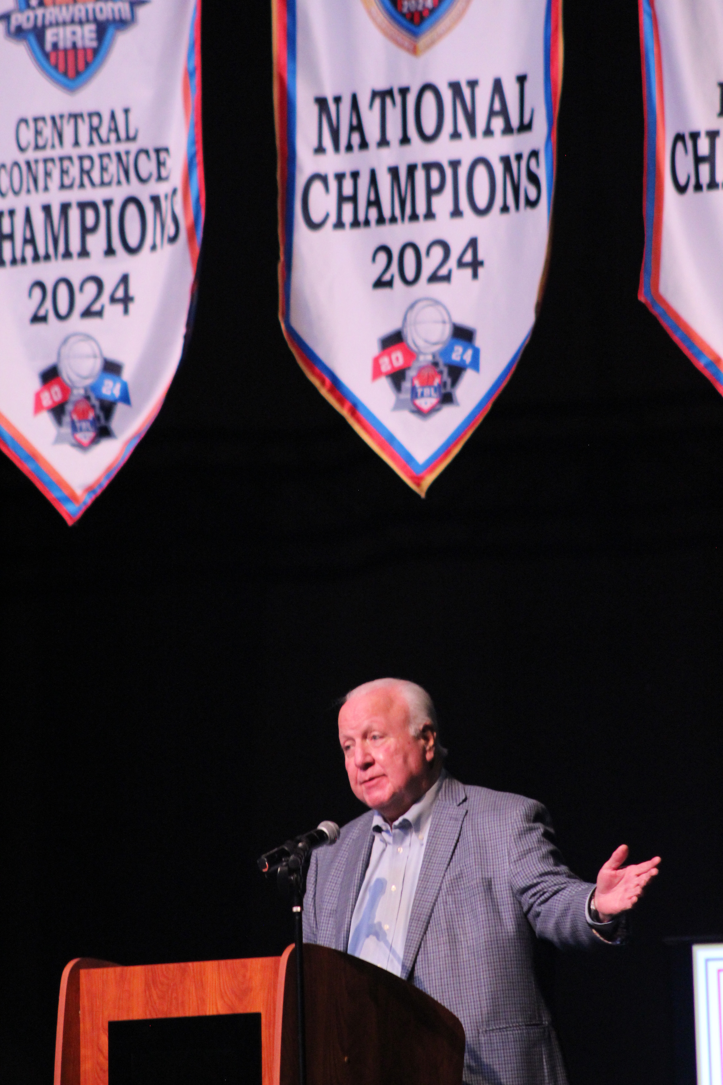 Under the Potawatomi Fire’s championship banners, Citizen Potawatomi Nation Chairman John “Rocky” Barrett speaks during the 2024 TBL Championship Banquet & Ring Ceremony at FireLake Arena on Jan. 17. The Fire were the first TBL (The Basketball League) team to be owned by a Native American tribe in 2022, and they have won the national championship for two years in a row. Countywide & Sun/Natasha Dunagan