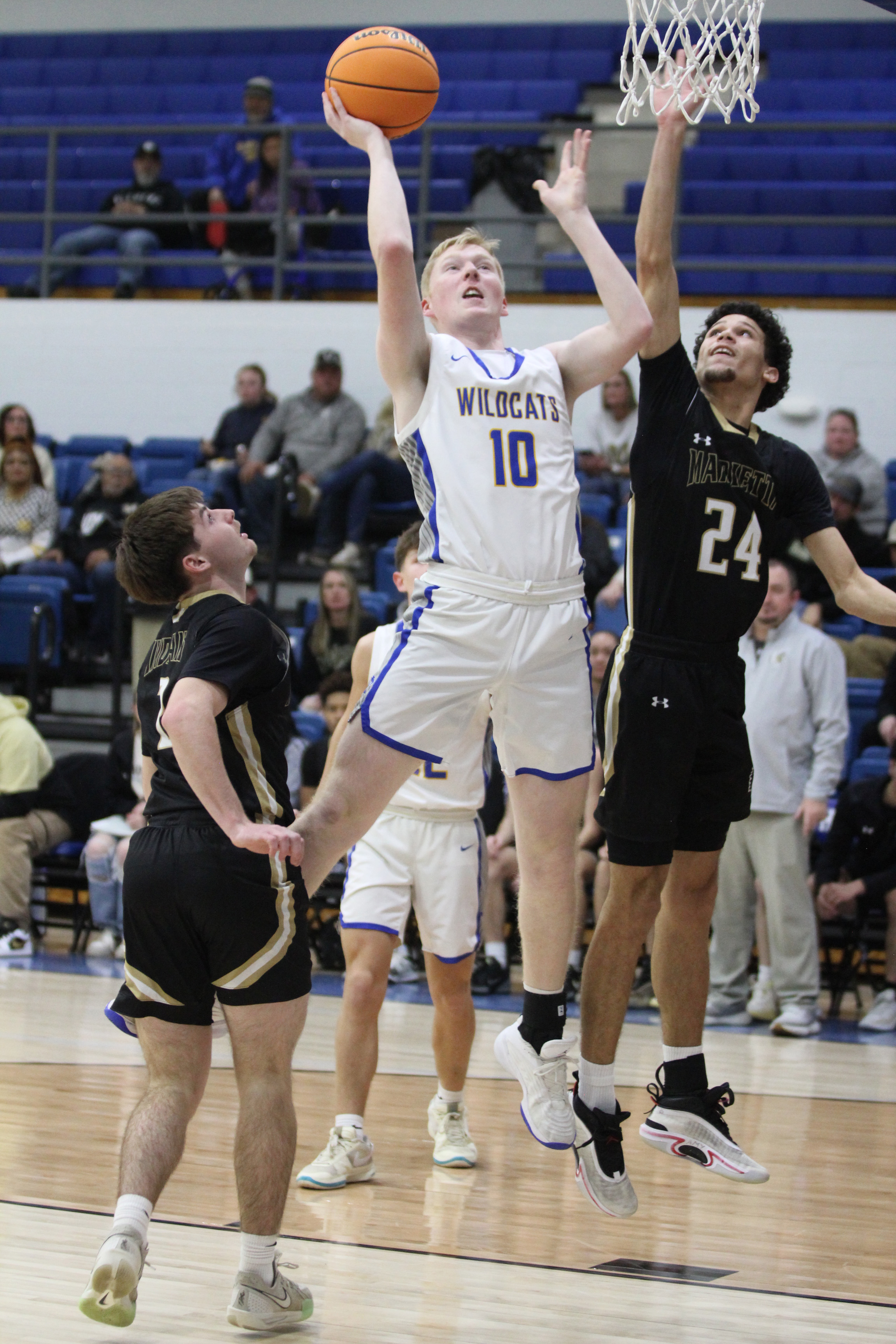 Bethel senior Austin Brown goes to the hoop in the Class 3A District game with Marietta on Feb. 22. The Wildcats won, 67-41, and will play in regionals today at 7:30 pm at home. Countywide & Sun/Natasha Dunagan