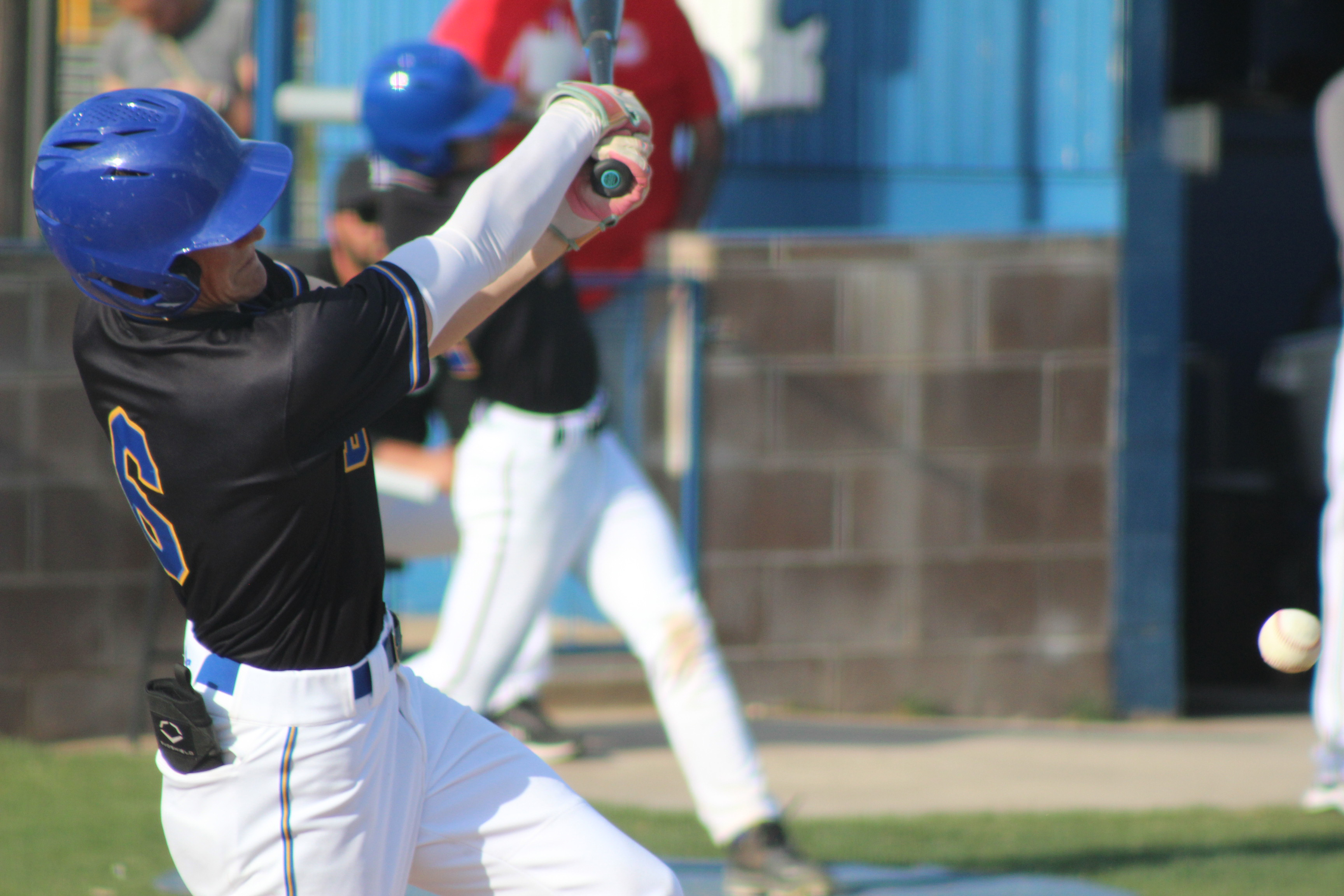 Bethel junior Zack Jennings sends the ball flying for a double during a double header home game against Tecumseh on April 17. The Savages won both games, 3-12 and 1-12. Natasha Dunagan, Countywide & Sun