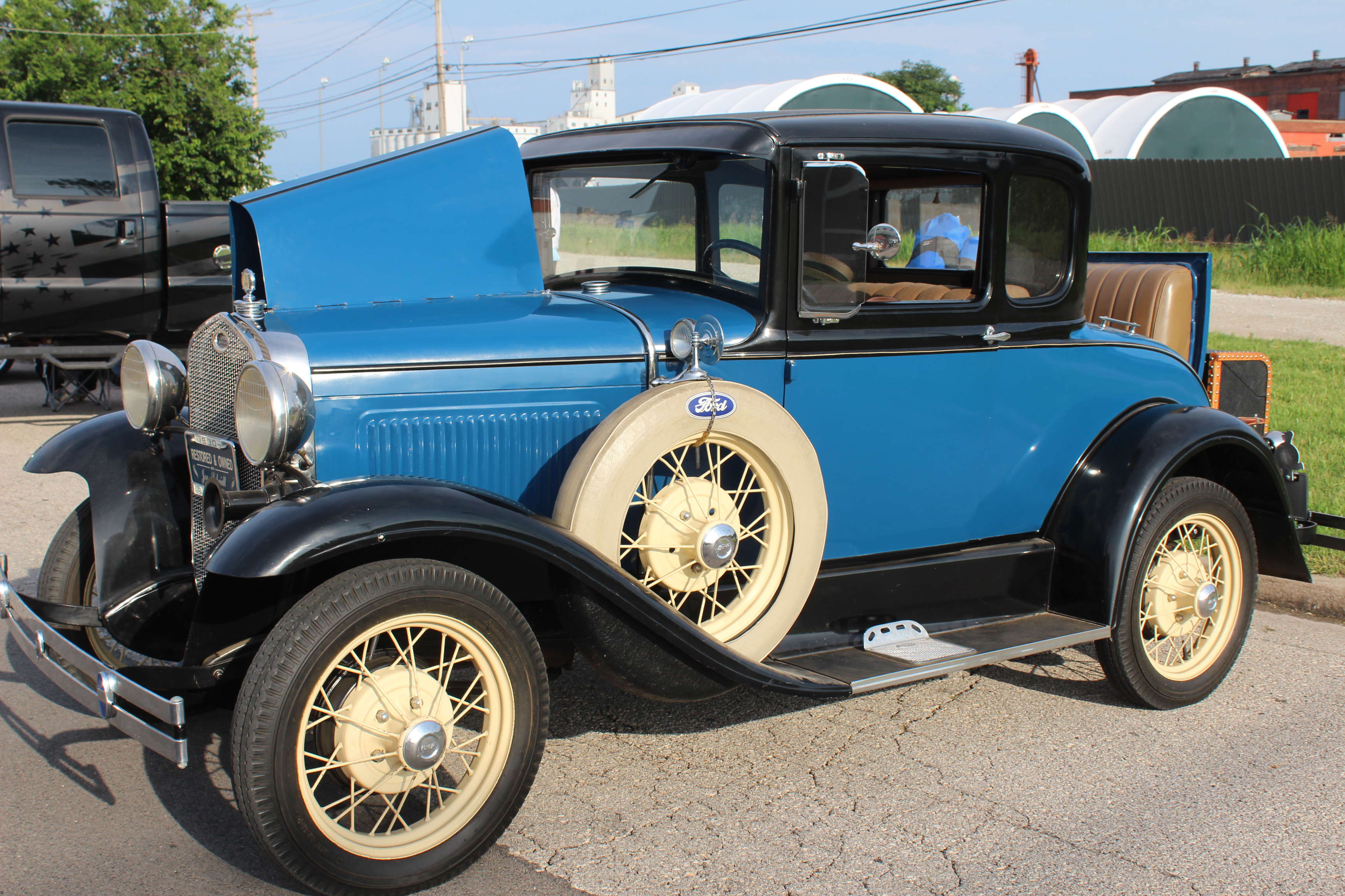 A 1930 Ford Model A, owned by Joe Scheidt, stands out at the Downtown Auto at Sundown Car Show in Shawnee on June 14. 