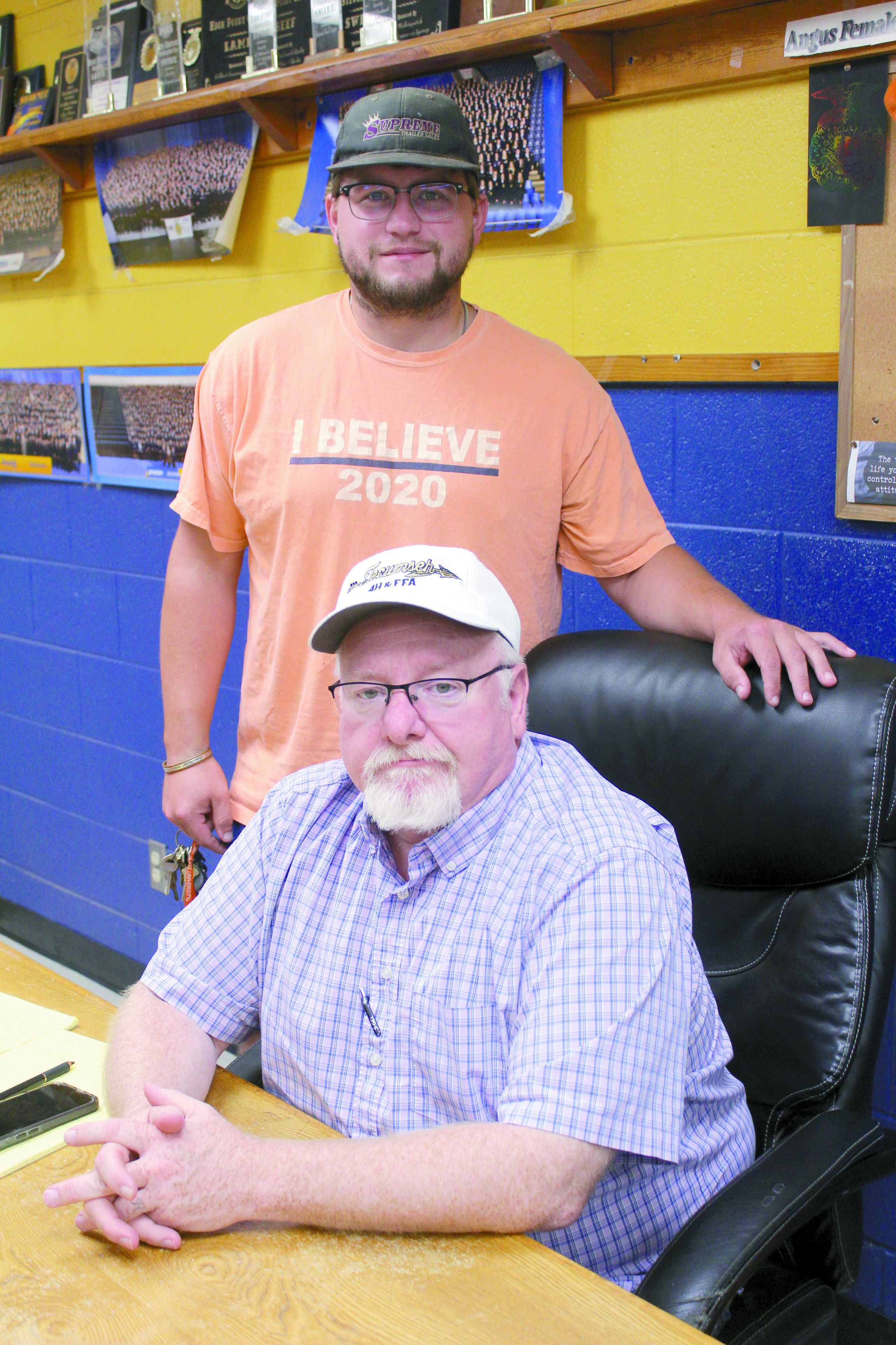 Ray Pell, seated, is bringing 20 years of experience teaching agriculture to Tecumseh's ag program. He joins his son, Corey Pell, who has been there for five years. Natasha Dunagan, Countywide & Sun