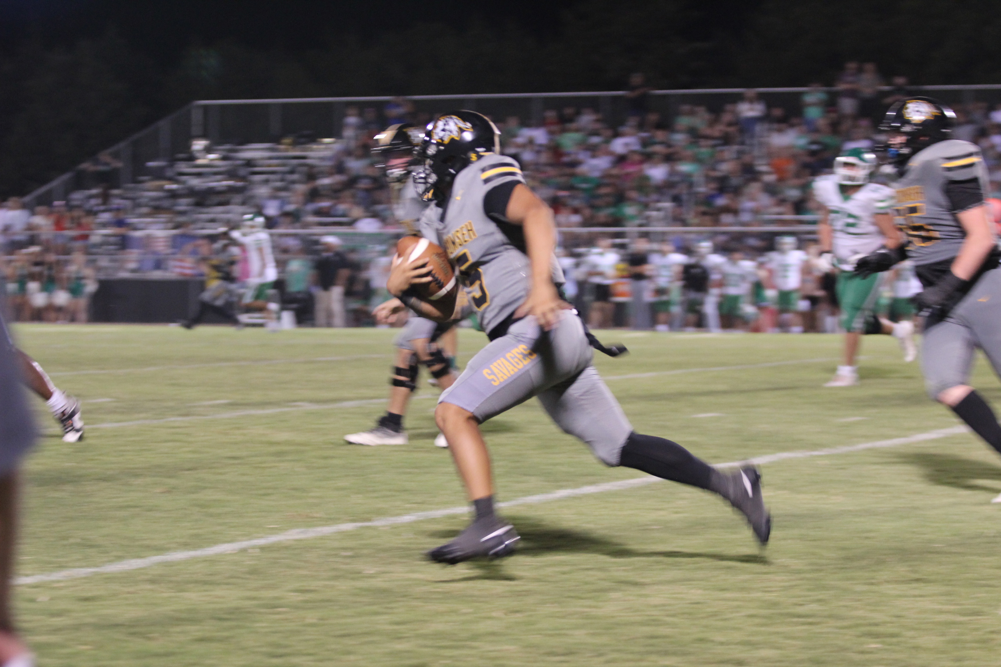 Tecumseh senior Hollin Barnes gains yardage during the first Savage home game on Sept. 13, 2024. File photo