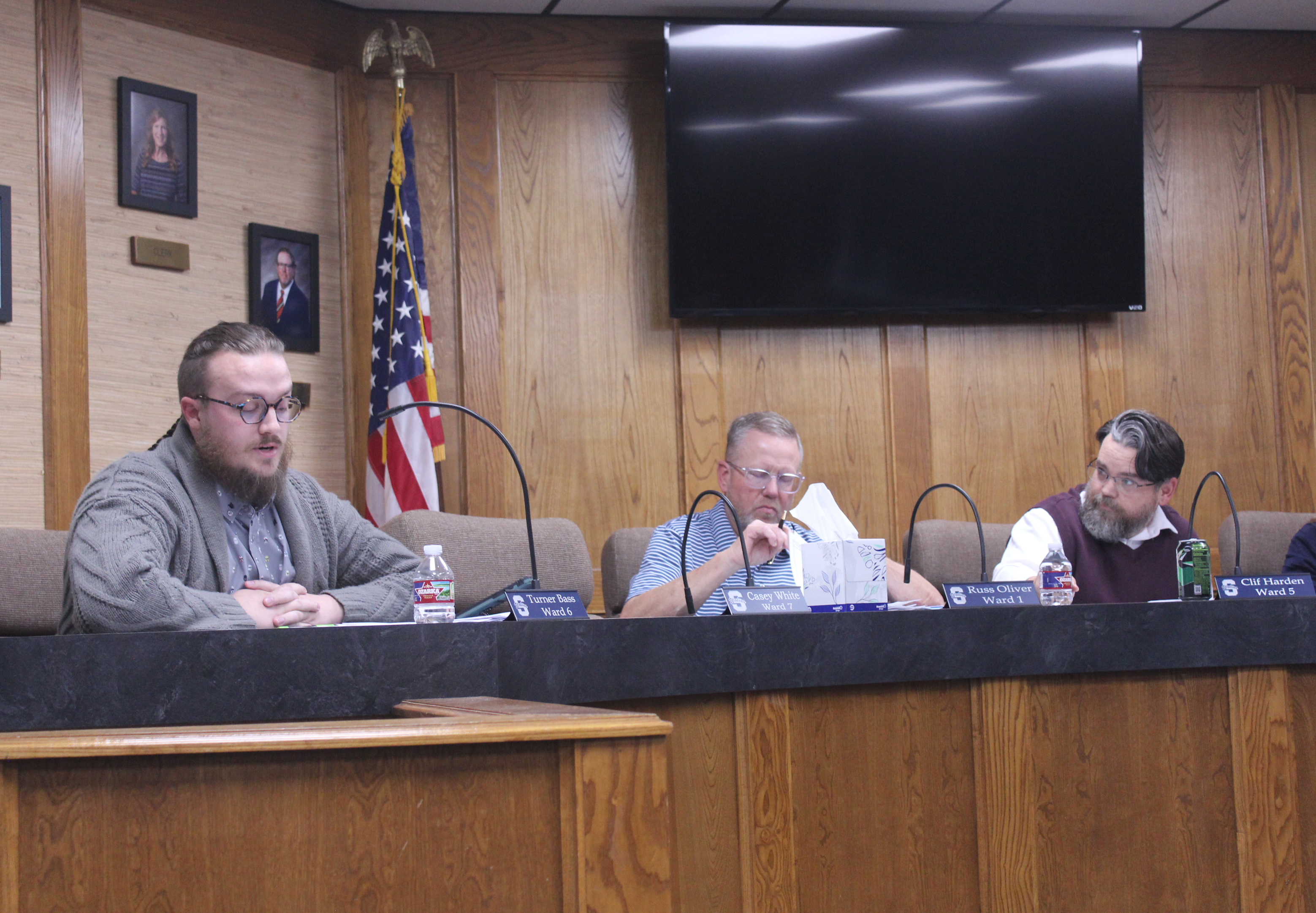 Shawnee Board of Education member Turner Bass asks questions about the incident which led to Cyndi Berger's removal from school premises before voting no on the superintendent's recommendation during a Special Session on Nov. 20. Also shown are Russ Oliver and Board President Clif Harden. Natasha Dunagan, Countywide & Sun