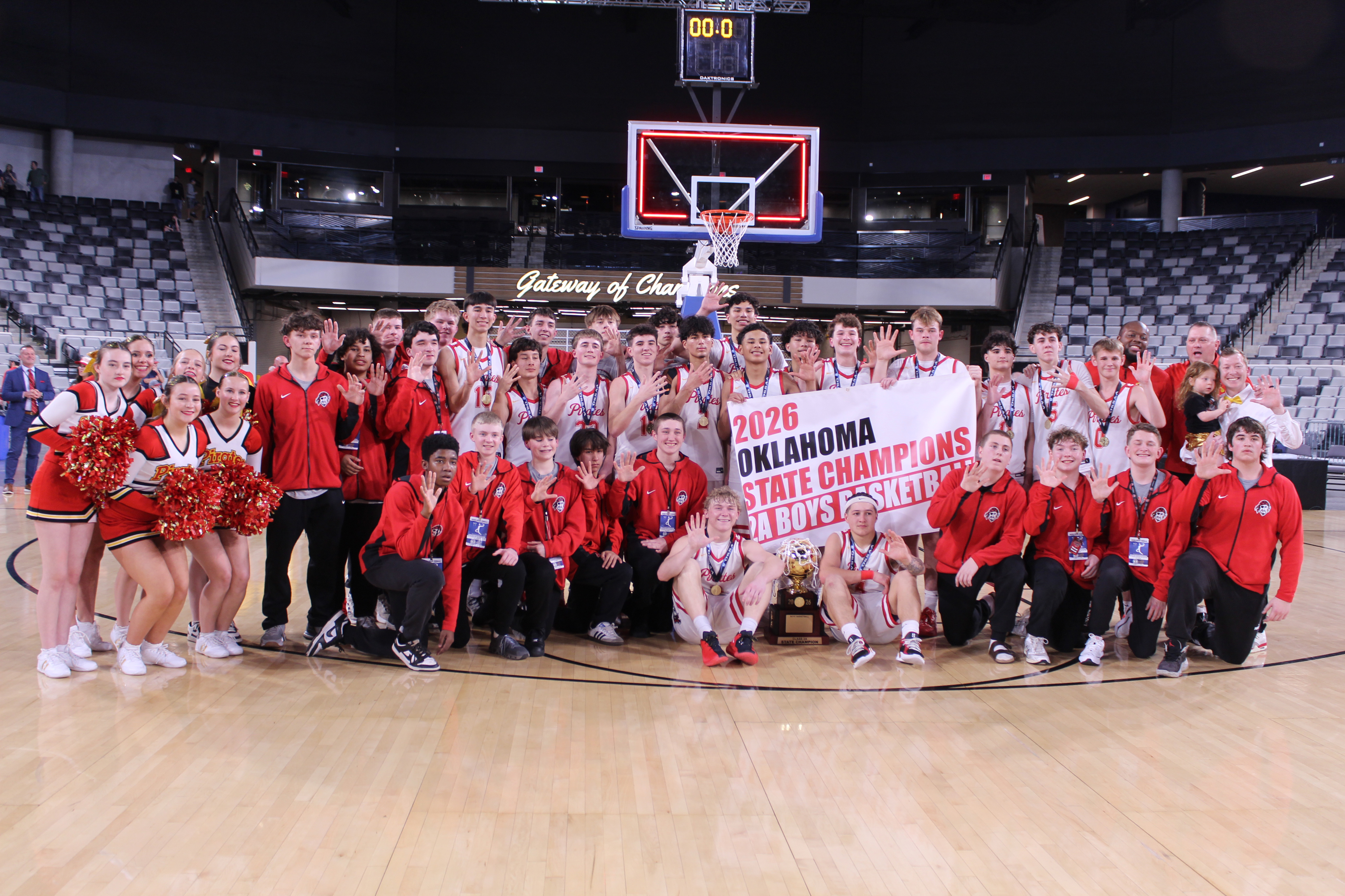 The Dale Pirates Basketball Team, Cheerleaders, Head Coach Fletcher Reed, Assistant Coach Oliver Willis and Assistant Coach Josh Forsythe pose after winning their fifth straight Class 2A State Championship at the OG&E Coliseum on Mar. 14. See the story and more photos under Sports tab, or click on the camera banner below to see all of our photos from the game! Natasha Dunagan, Countywide & Sun