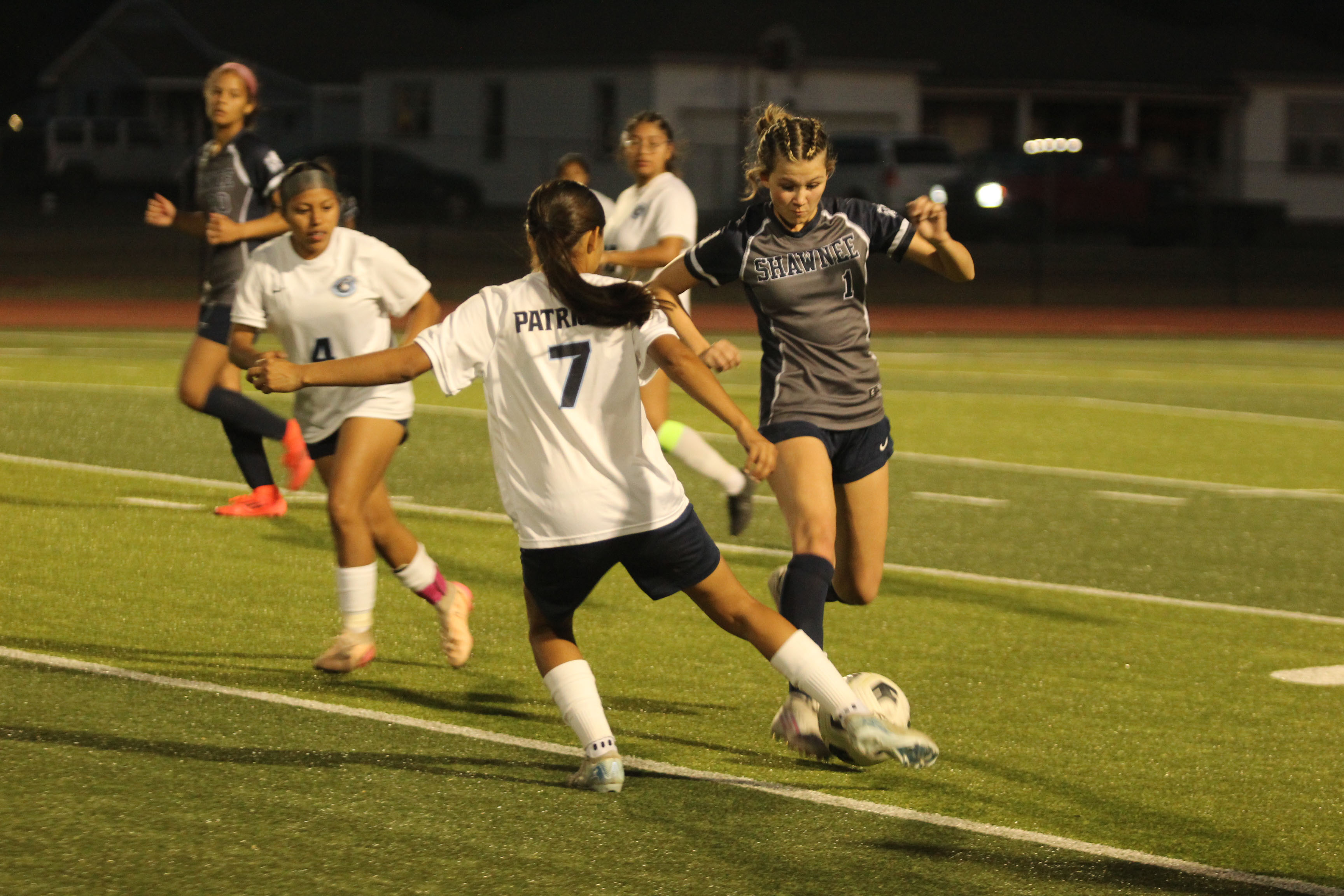 Shawnee's Khalli Sparks prepares to take control of the ball during the March 24 home game against Putnam City West. The Lady Wolves lost 0-6. Natasha Dunagan, Countywide & Sun