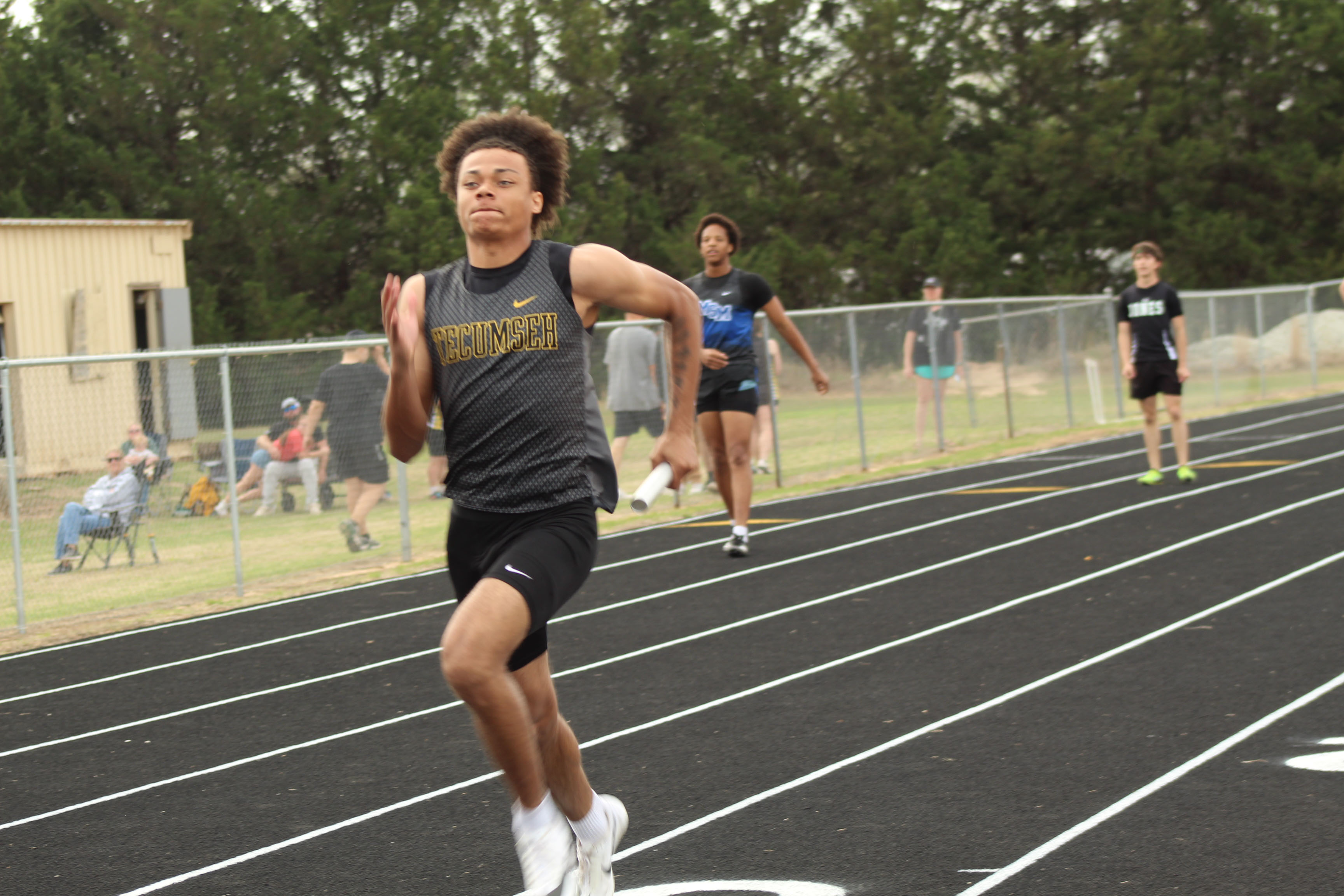 Tecumseh senior Jekhi Owens runs in one of the three relay races he competed in during the Tecumseh Track Meet on March 31. Track Coach Kourtney Ozment said in an email that they hosted seven schools, with students in seventh- and eighth-grades and high school, and Owens' relay team placed second in the 4x400 that day. Photos by Natasha Dunagan, Countywide & Sun. Click on the camera banner ad below to see all the photos from the meet!