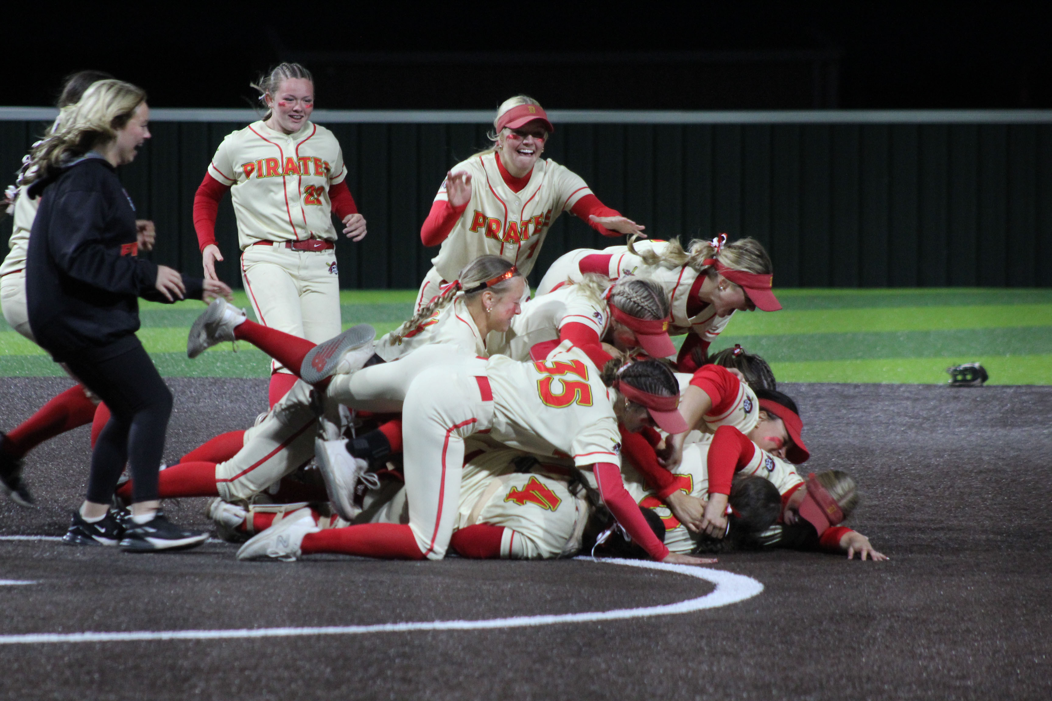The Dale Lady Pirates celebrate with a dogpile after winning the Class 4A Slow Pitch State Championship at FireLake Ball Fields on May 5. The Lady Pirates narrowly beat Silo, 18-17, as well as Coalgate, 14-5, and Howe, 15-0. They end their season with a record of 39-4. See next week's Countywide & Sun (May 14, 2026) for the full story and more photos. Natasha Dunagan, Countywide & Sun