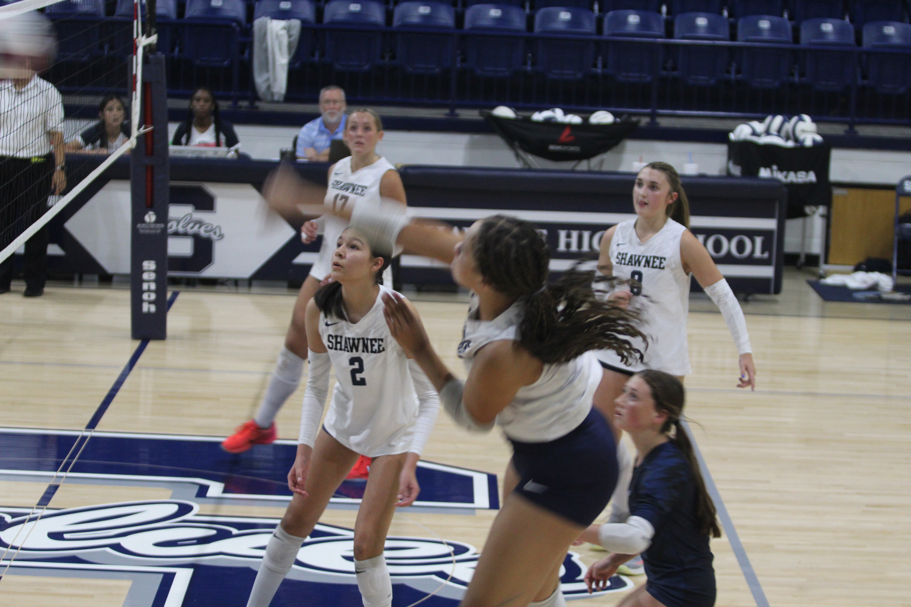 Shawnee freshman Brylee Cosby makes an attack during the second set of the Aug. 27 home match against El Reno. The Shawnee Lady Wolves lost 1-3 with match scores of 15-25, 25-20, 22-25 and 18-25. Also shown are Ava Plumley (#2), Molly Megehee (#17), Suzy Howle (#8) and Libero Parker Lilley (#10). Photos by Natasha Dunagan, Countywide & Sun